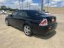 2006 black Ford Fusion S (3FAFP06Z46R) with an 2.3L L4 DOHC 16V engine, Manual transmission, located at 14700 Tomball Parkway 249, Houston, TX, 77086, (281) 444-2200, 29.928619, -95.504074 - Photo#6