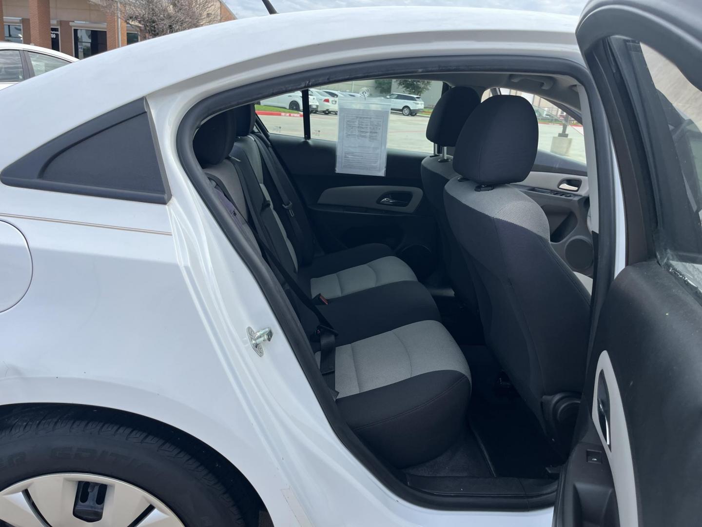 2014 Chevrolet Cruze LS Auto (1G1PA5SH5E7) with an 1.8L L4 DOHC 16V FFV engine, 6-Speed Automatic transmission, located at 14700 Tomball Parkway 249, Houston, TX, 77086, (281) 444-2200, 29.928619, -95.504074 - Photo#10