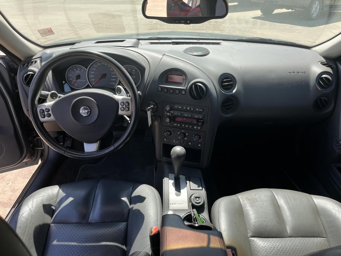 2004 Pontiac Grand Prix GTP (2G2WR524641) with an 3.8L V6 12V OHV engine, 4-Speed Automatic Overdrive transmission, located at 14700 Tomball Parkway 249, Houston, TX, 77086, (281) 444-2200, 29.928619, -95.504074 - Photo#10