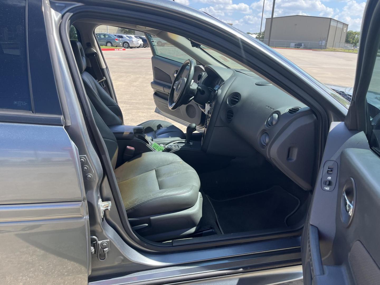 2004 Pontiac Grand Prix GTP (2G2WR524641) with an 3.8L V6 12V OHV engine, 4-Speed Automatic Overdrive transmission, located at 14700 Tomball Parkway 249, Houston, TX, 77086, (281) 444-2200, 29.928619, -95.504074 - Photo#11