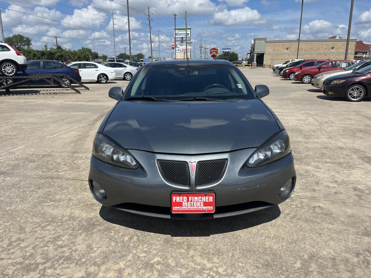 2004 Pontiac Grand Prix GTP (2G2WR524641) with an 3.8L V6 12V OHV engine, 4-Speed Automatic Overdrive transmission, located at 14700 Tomball Parkway 249, Houston, TX, 77086, (281) 444-2200, 29.928619, -95.504074 - Photo#4