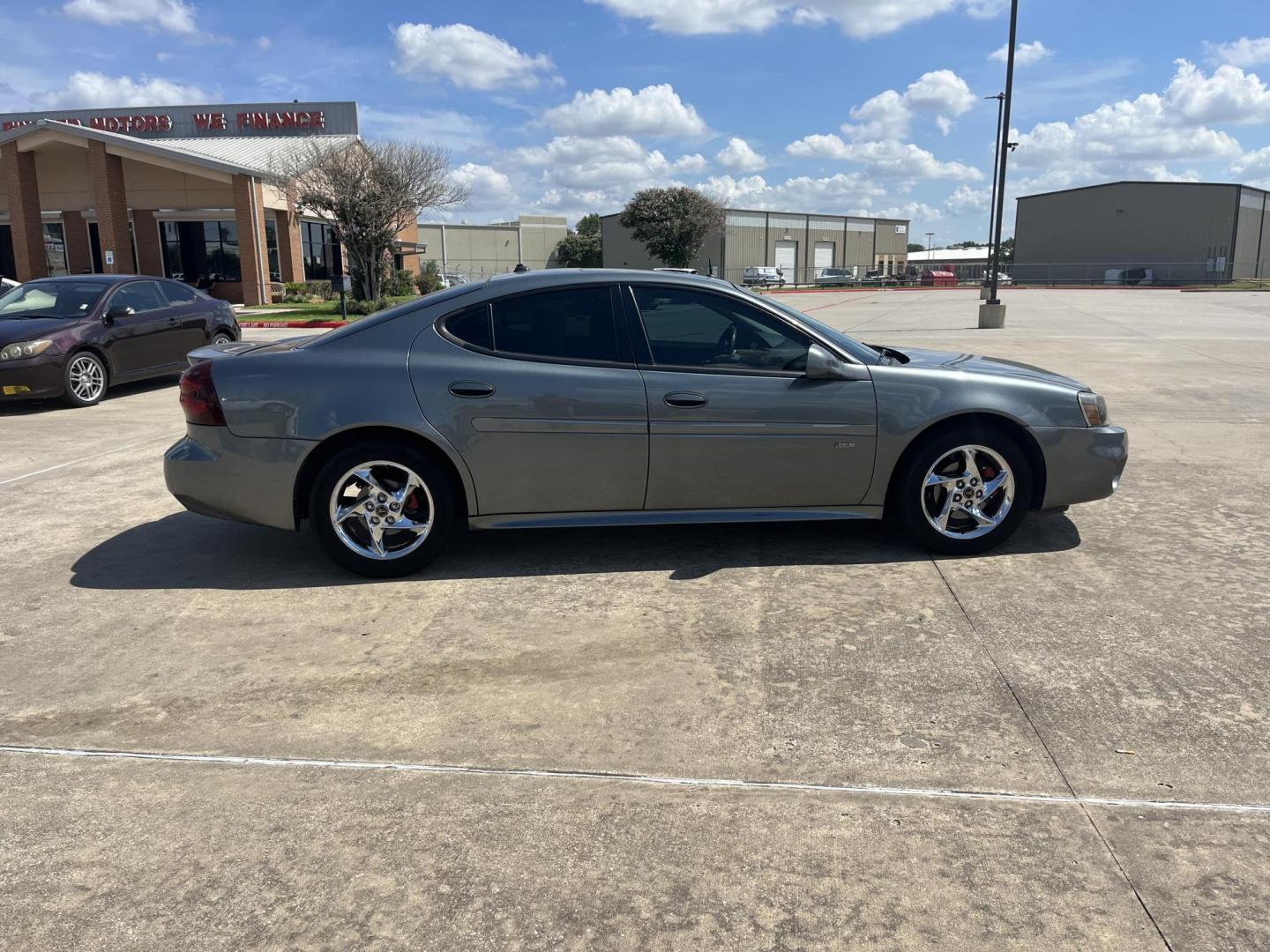 2004 Pontiac Grand Prix GTP (2G2WR524641) with an 3.8L V6 12V OHV engine, 4-Speed Automatic Overdrive transmission, located at 14700 Tomball Parkway 249, Houston, TX, 77086, (281) 444-2200, 29.928619, -95.504074 - Photo#6