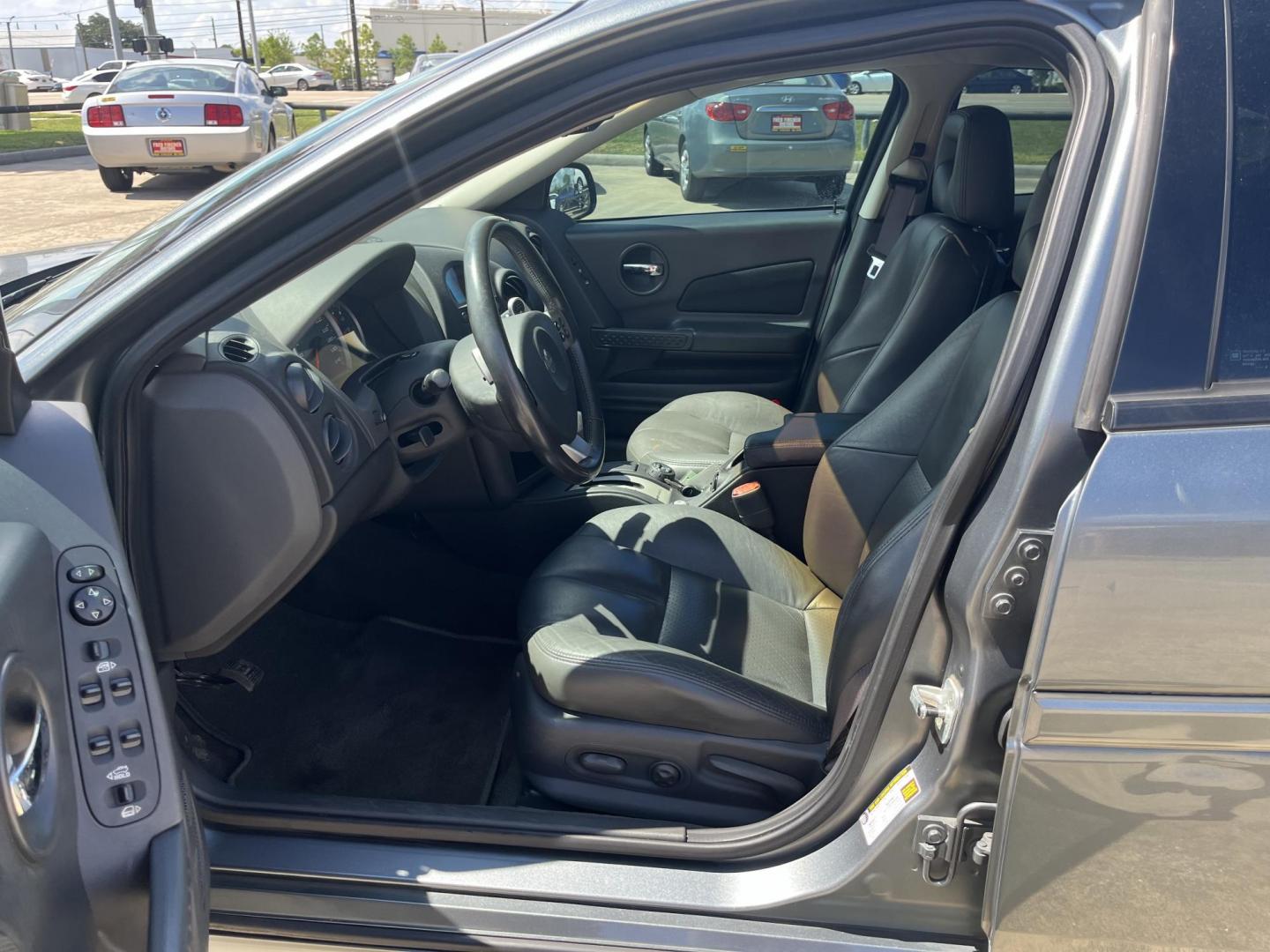 2004 Pontiac Grand Prix GTP (2G2WR524641) with an 3.8L V6 12V OHV engine, 4-Speed Automatic Overdrive transmission, located at 14700 Tomball Parkway 249, Houston, TX, 77086, (281) 444-2200, 29.928619, -95.504074 - Photo#8