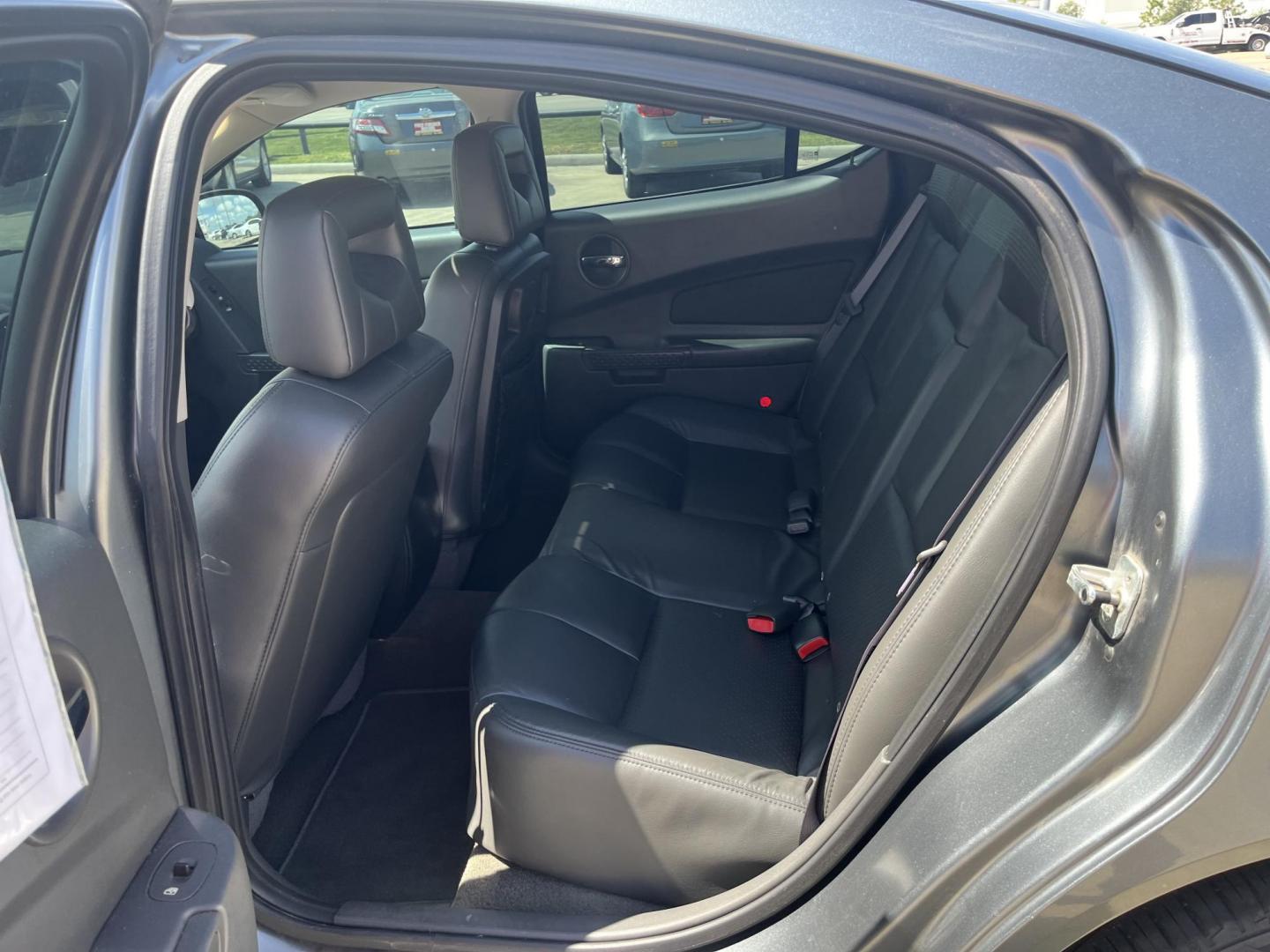 2004 Pontiac Grand Prix GTP (2G2WR524641) with an 3.8L V6 12V OHV engine, 4-Speed Automatic Overdrive transmission, located at 14700 Tomball Parkway 249, Houston, TX, 77086, (281) 444-2200, 29.928619, -95.504074 - Photo#9