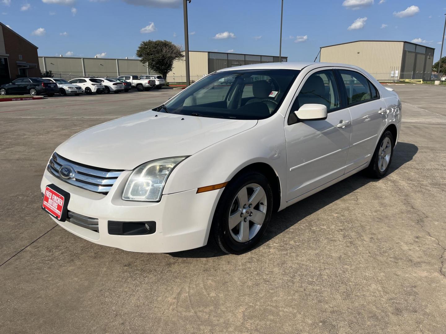 2009 Ford Fusion V6 SE (3FAHP07169R) with an 3.0L V6 DOHC 24V engine, AUTOMATIC transmission, located at 14700 Tomball Parkway 249, Houston, TX, 77086, (281) 444-2200, 29.928619, -95.504074 - Photo#2