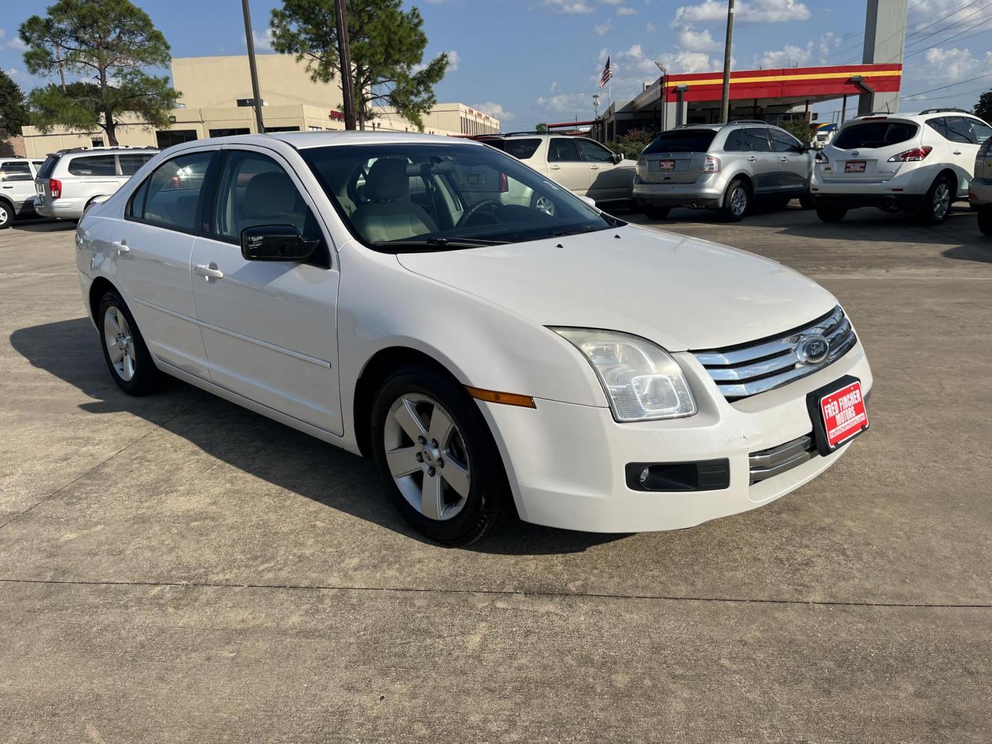 2009 Ford Fusion V6 SE (3FAHP07169R) with an 3.0L V6 DOHC 24V engine, AUTOMATIC transmission, located at 14700 Tomball Parkway 249, Houston, TX, 77086, (281) 444-2200, 29.928619, -95.504074 - Photo#0