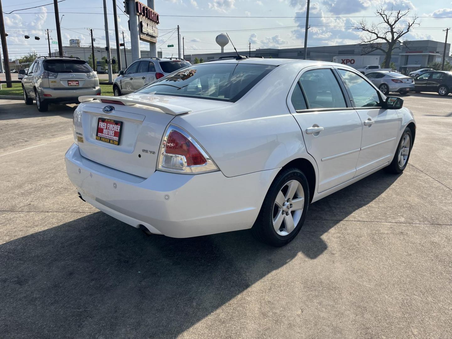 2009 Ford Fusion V6 SE (3FAHP07169R) with an 3.0L V6 DOHC 24V engine, AUTOMATIC transmission, located at 14700 Tomball Parkway 249, Houston, TX, 77086, (281) 444-2200, 29.928619, -95.504074 - Photo#5