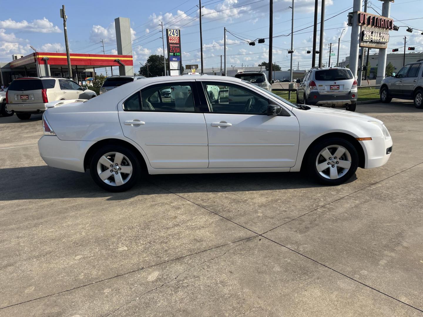 2009 Ford Fusion V6 SE (3FAHP07169R) with an 3.0L V6 DOHC 24V engine, AUTOMATIC transmission, located at 14700 Tomball Parkway 249, Houston, TX, 77086, (281) 444-2200, 29.928619, -95.504074 - Photo#6