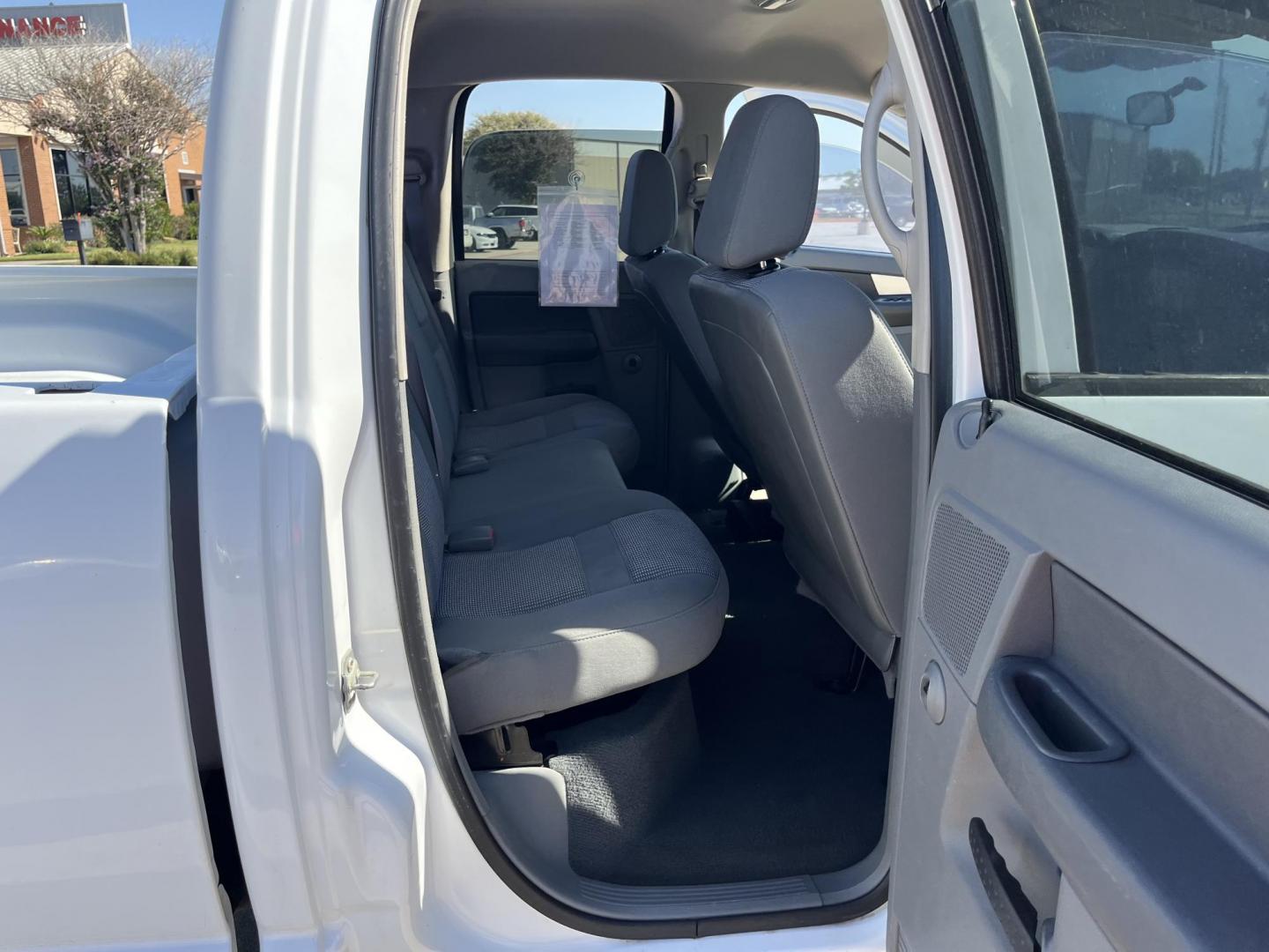 2007 Dodge Ram 1500 Laramie Quad Cab 2WD (1D7HA18P77S) with an 4.7L V8 SOHC 16V FFV engine, Automatic Overdrive transmission, located at 14700 Tomball Parkway 249, Houston, TX, 77086, (281) 444-2200, 29.928619, -95.504074 - Photo#12