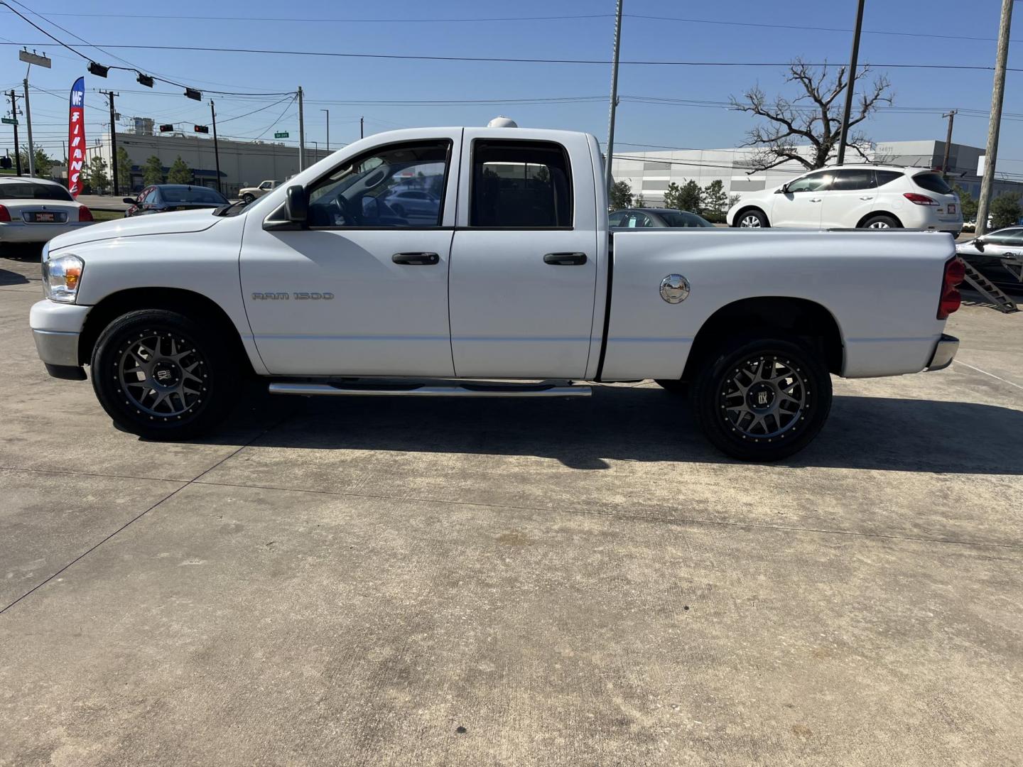 2007 Dodge Ram 1500 Laramie Quad Cab 2WD (1D7HA18P77S) with an 4.7L V8 SOHC 16V FFV engine, Automatic Overdrive transmission, located at 14700 Tomball Parkway 249, Houston, TX, 77086, (281) 444-2200, 29.928619, -95.504074 - Photo#3