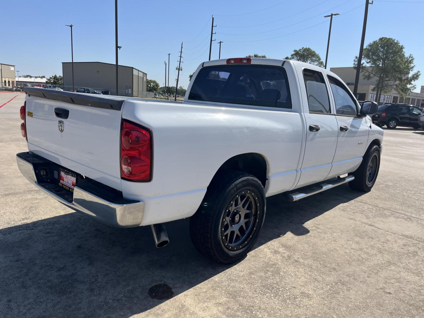 2007 Dodge Ram 1500 Laramie Quad Cab 2WD (1D7HA18P77S) with an 4.7L V8 SOHC 16V FFV engine, Automatic Overdrive transmission, located at 14700 Tomball Parkway 249, Houston, TX, 77086, (281) 444-2200, 29.928619, -95.504074 - Photo#6