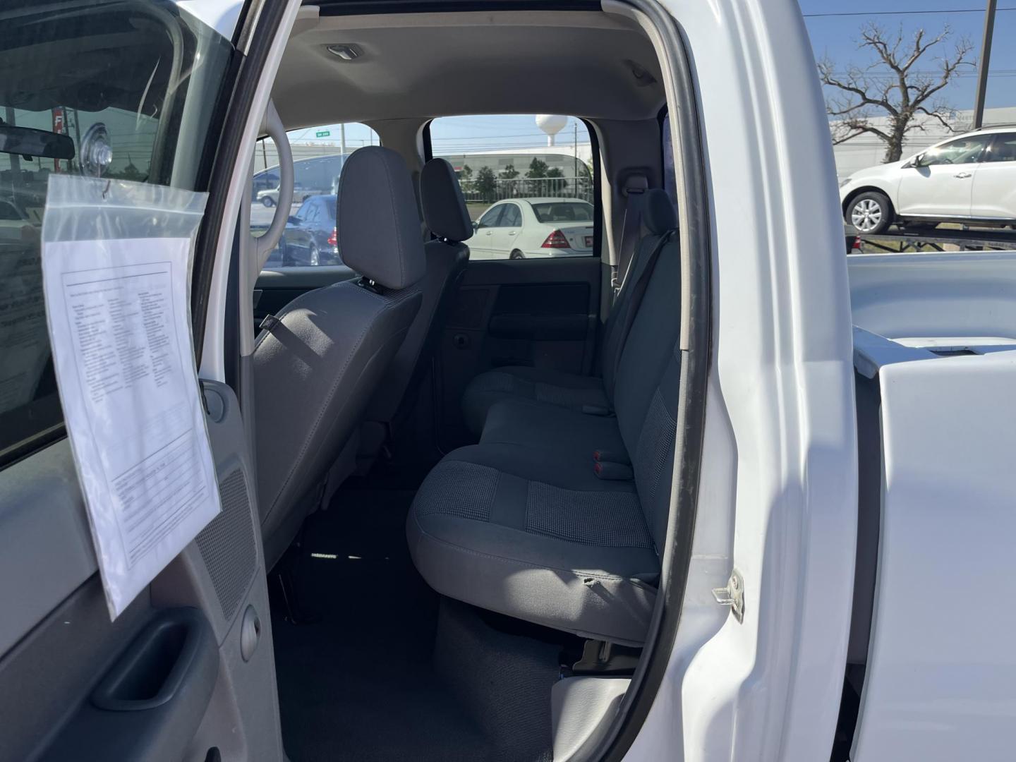 2007 Dodge Ram 1500 Laramie Quad Cab 2WD (1D7HA18P77S) with an 4.7L V8 SOHC 16V FFV engine, Automatic Overdrive transmission, located at 14700 Tomball Parkway 249, Houston, TX, 77086, (281) 444-2200, 29.928619, -95.504074 - Photo#9