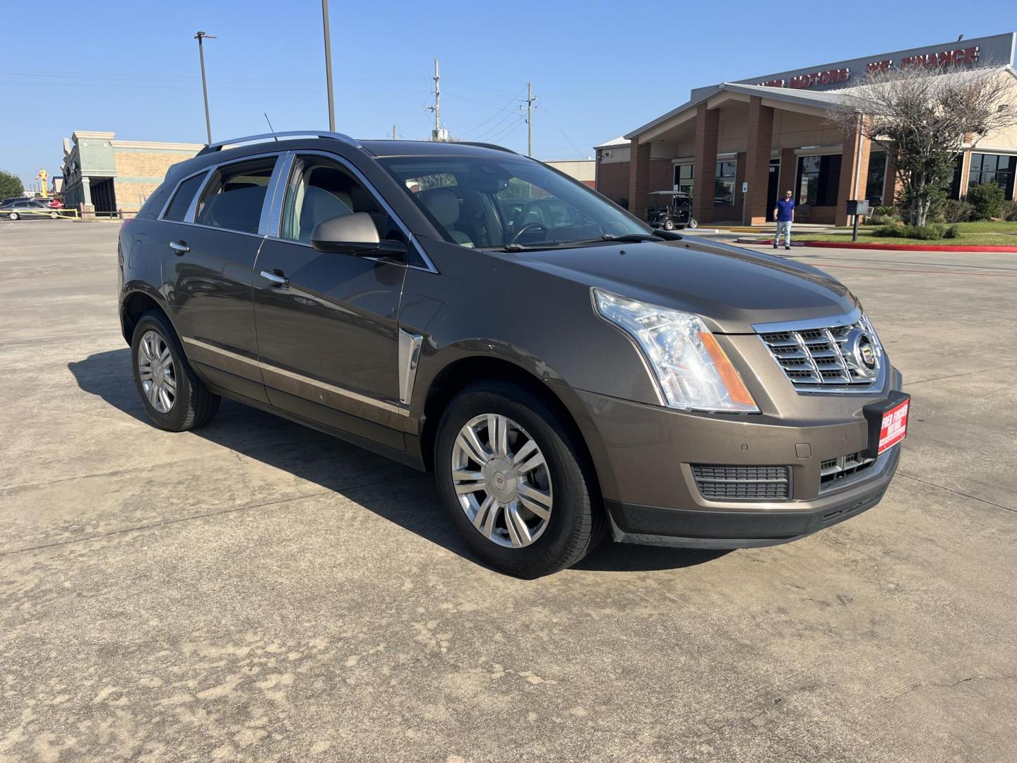 2014 Cadillac SRX Luxury Collection FWD (3GYFNBE30ES) with an 3.6L V6 DOHC 24V FFV engine, 6-Speed Automatic transmission, located at 14700 Tomball Parkway 249, Houston, TX, 77086, (281) 444-2200, 29.928619, -95.504074 - Photo#0
