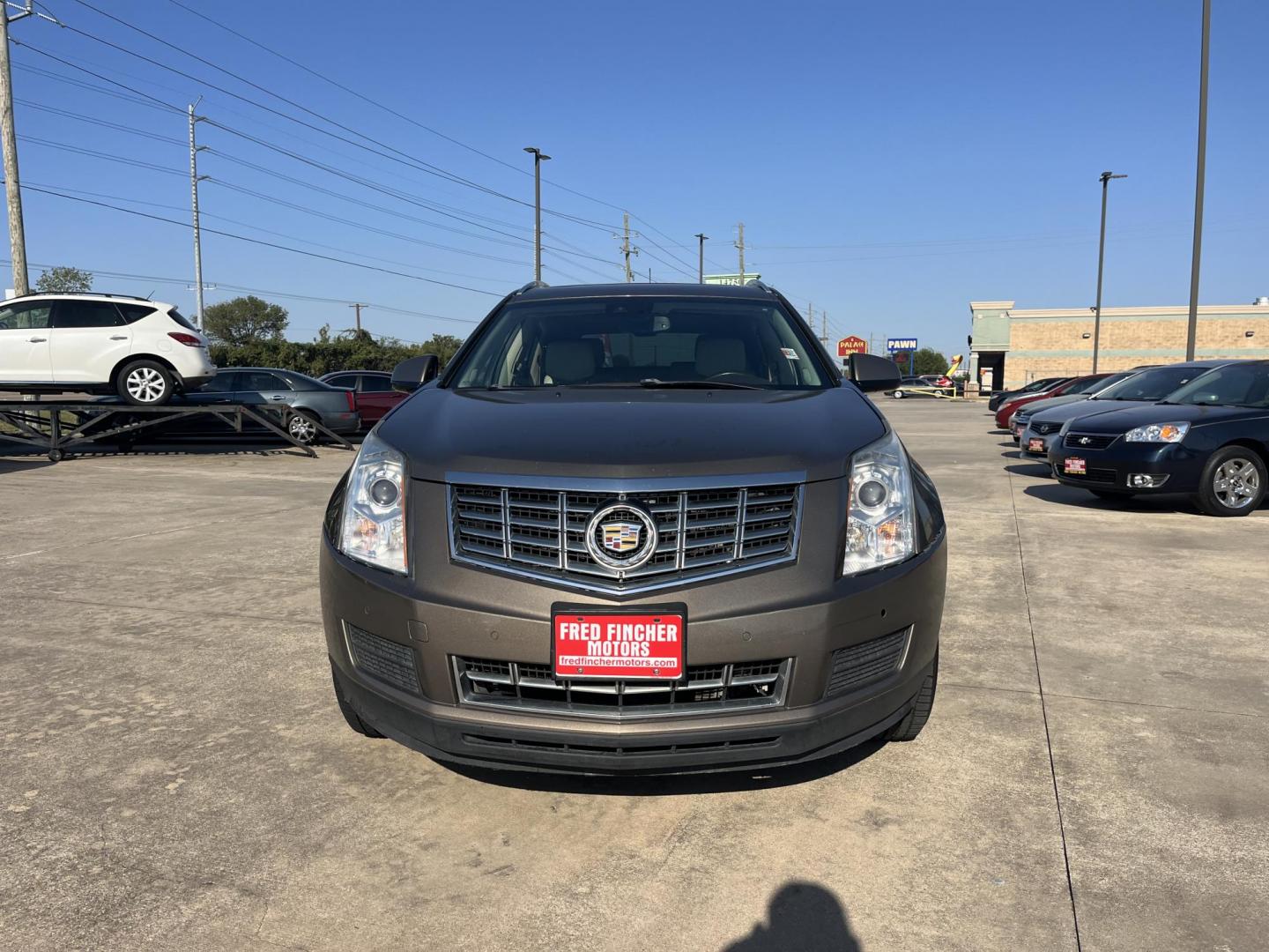 2014 Cadillac SRX Luxury Collection FWD (3GYFNBE30ES) with an 3.6L V6 DOHC 24V FFV engine, 6-Speed Automatic transmission, located at 14700 Tomball Parkway 249, Houston, TX, 77086, (281) 444-2200, 29.928619, -95.504074 - Photo#3
