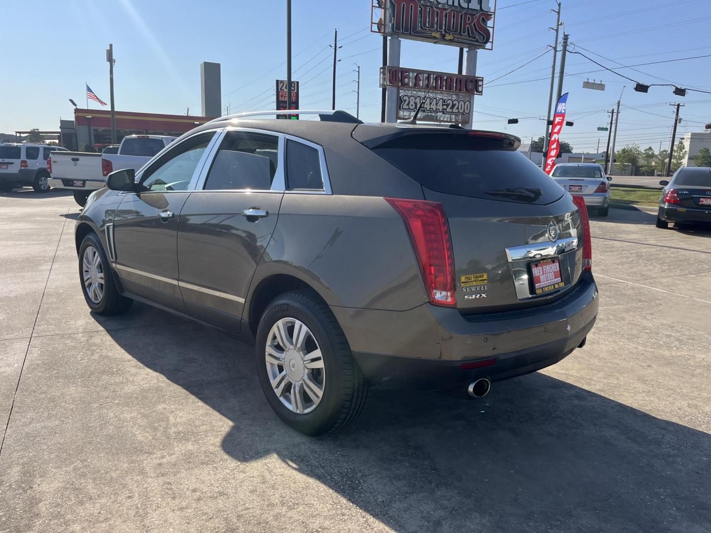 2014 Cadillac SRX Luxury Collection FWD (3GYFNBE30ES) with an 3.6L V6 DOHC 24V FFV engine, 6-Speed Automatic transmission, located at 14700 Tomball Parkway 249, Houston, TX, 77086, (281) 444-2200, 29.928619, -95.504074 - Photo#5