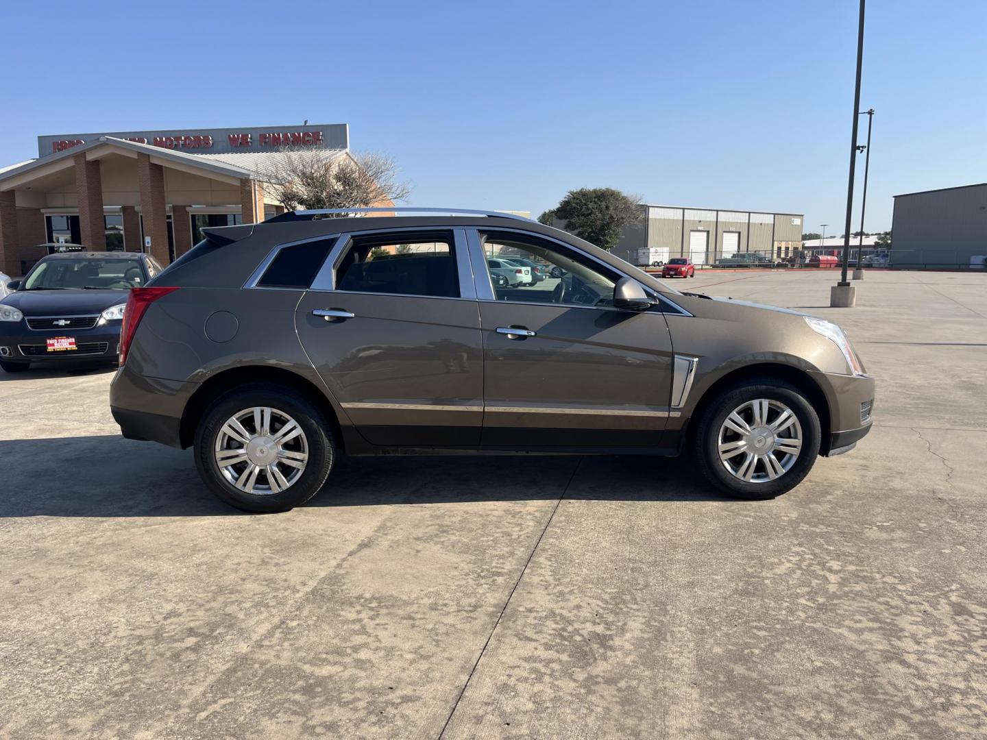 2014 Cadillac SRX Luxury Collection FWD (3GYFNBE30ES) with an 3.6L V6 DOHC 24V FFV engine, 6-Speed Automatic transmission, located at 14700 Tomball Parkway 249, Houston, TX, 77086, (281) 444-2200, 29.928619, -95.504074 - Photo#6