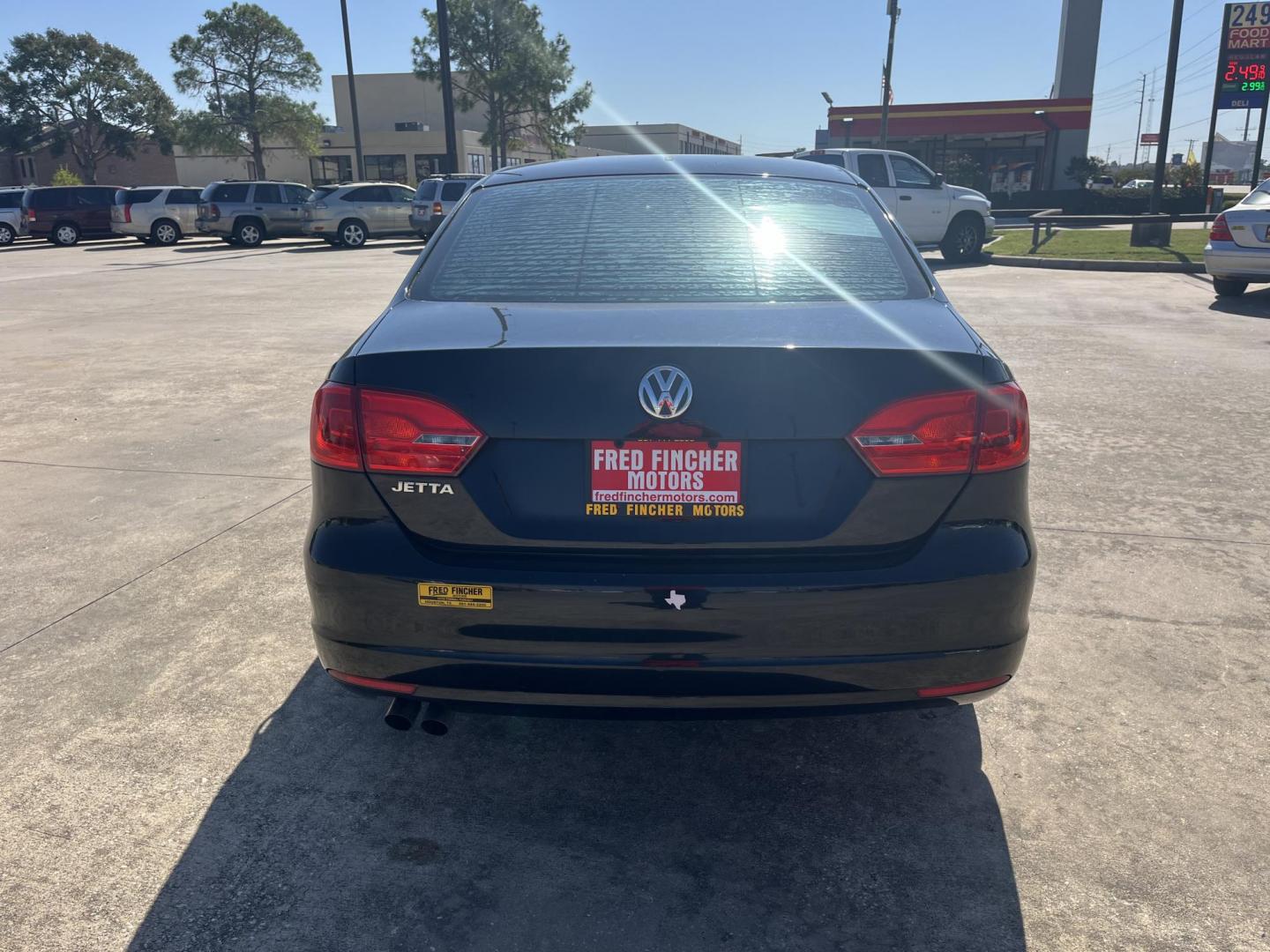 2013 Black /black Volkswagen Jetta S (3VW2K7AJ5DM) with an 2.0L L4 DOHC 20V engine, Automatic Overdrive transmission, located at 14700 Tomball Parkway 249, Houston, TX, 77086, (281) 444-2200, 29.928619, -95.504074 - Photo#4