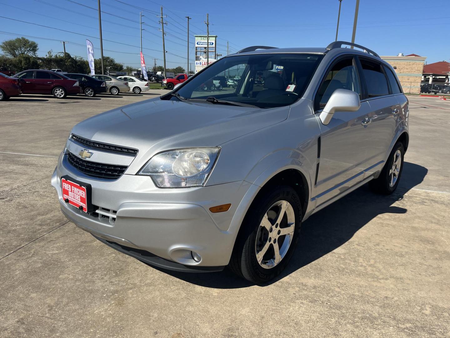 2012 SILVER /black Chevrolet Captiva Sport LTZ AWD (3GNFL4E51CS) with an 3.0L V6 DOHC 24V engine, 6-Speed Automatic transmission, located at 14700 Tomball Parkway 249, Houston, TX, 77086, (281) 444-2200, 29.928619, -95.504074 - Photo#2