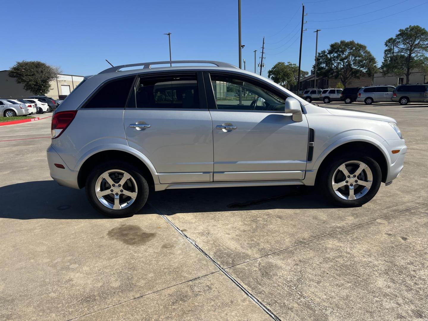 2012 SILVER /black Chevrolet Captiva Sport LTZ AWD (3GNFL4E51CS) with an 3.0L V6 DOHC 24V engine, 6-Speed Automatic transmission, located at 14700 Tomball Parkway 249, Houston, TX, 77086, (281) 444-2200, 29.928619, -95.504074 - Photo#6