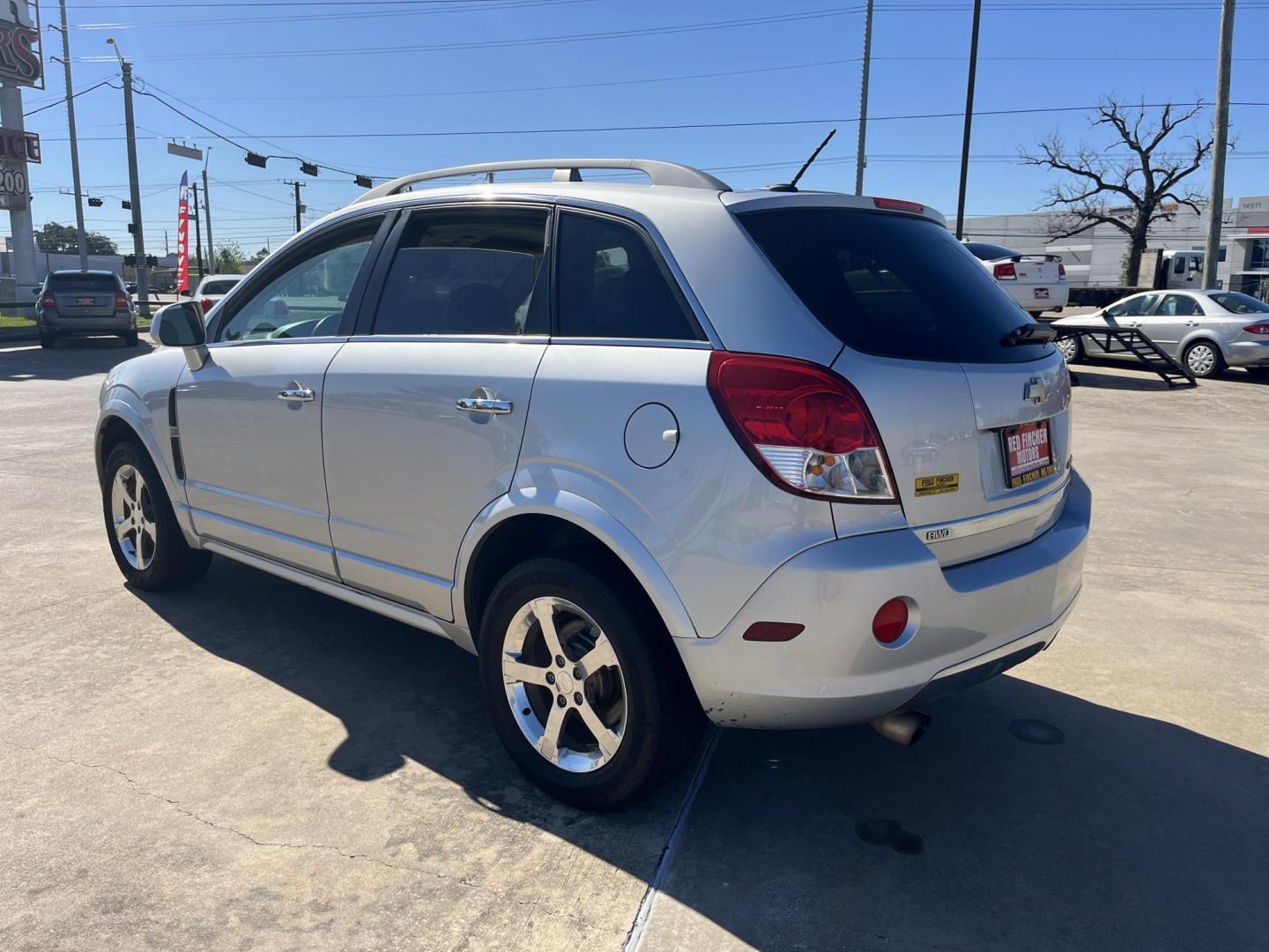 2012 SILVER /black Chevrolet Captiva Sport LTZ AWD (3GNFL4E51CS) with an 3.0L V6 DOHC 24V engine, 6-Speed Automatic transmission, located at 14700 Tomball Parkway 249, Houston, TX, 77086, (281) 444-2200, 29.928619, -95.504074 - Photo#8