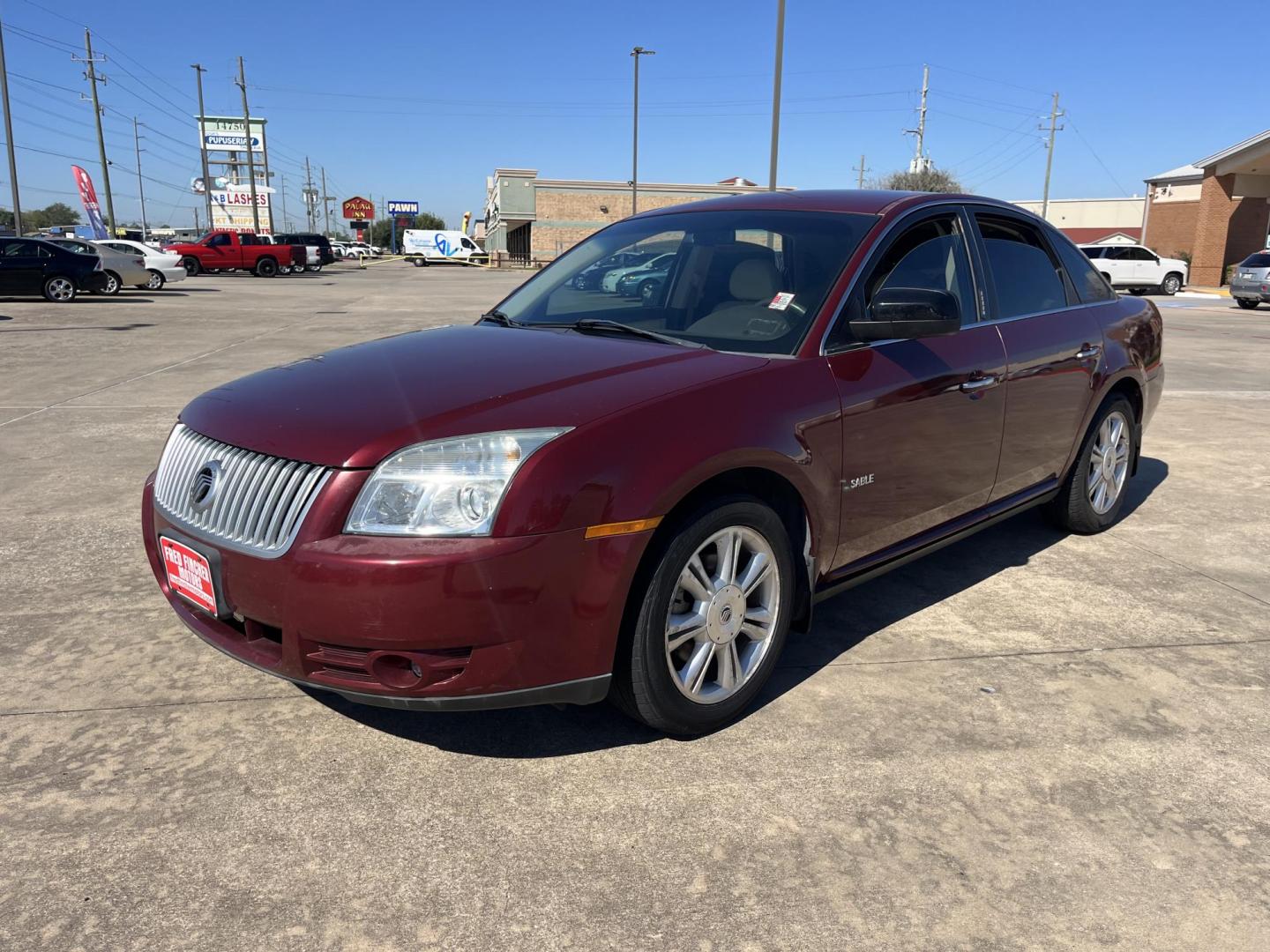 2008 maroom /TAN Mercury Sable Premier (1MEHM42W68G) with an 3.5L V6 DOHC 24V engine, 6-Speed Automatic Overdrive transmission, located at 14700 Tomball Parkway 249, Houston, TX, 77086, (281) 444-2200, 29.928619, -95.504074 - Photo#2