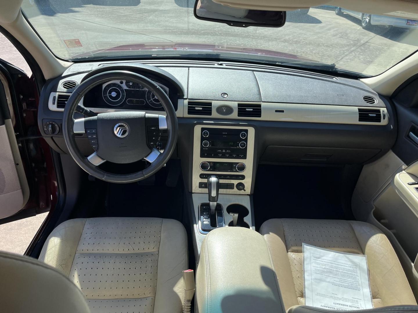 2008 maroom /TAN Mercury Sable Premier (1MEHM42W68G) with an 3.5L V6 DOHC 24V engine, 6-Speed Automatic Overdrive transmission, located at 14700 Tomball Parkway 249, Houston, TX, 77086, (281) 444-2200, 29.928619, -95.504074 - Photo#10