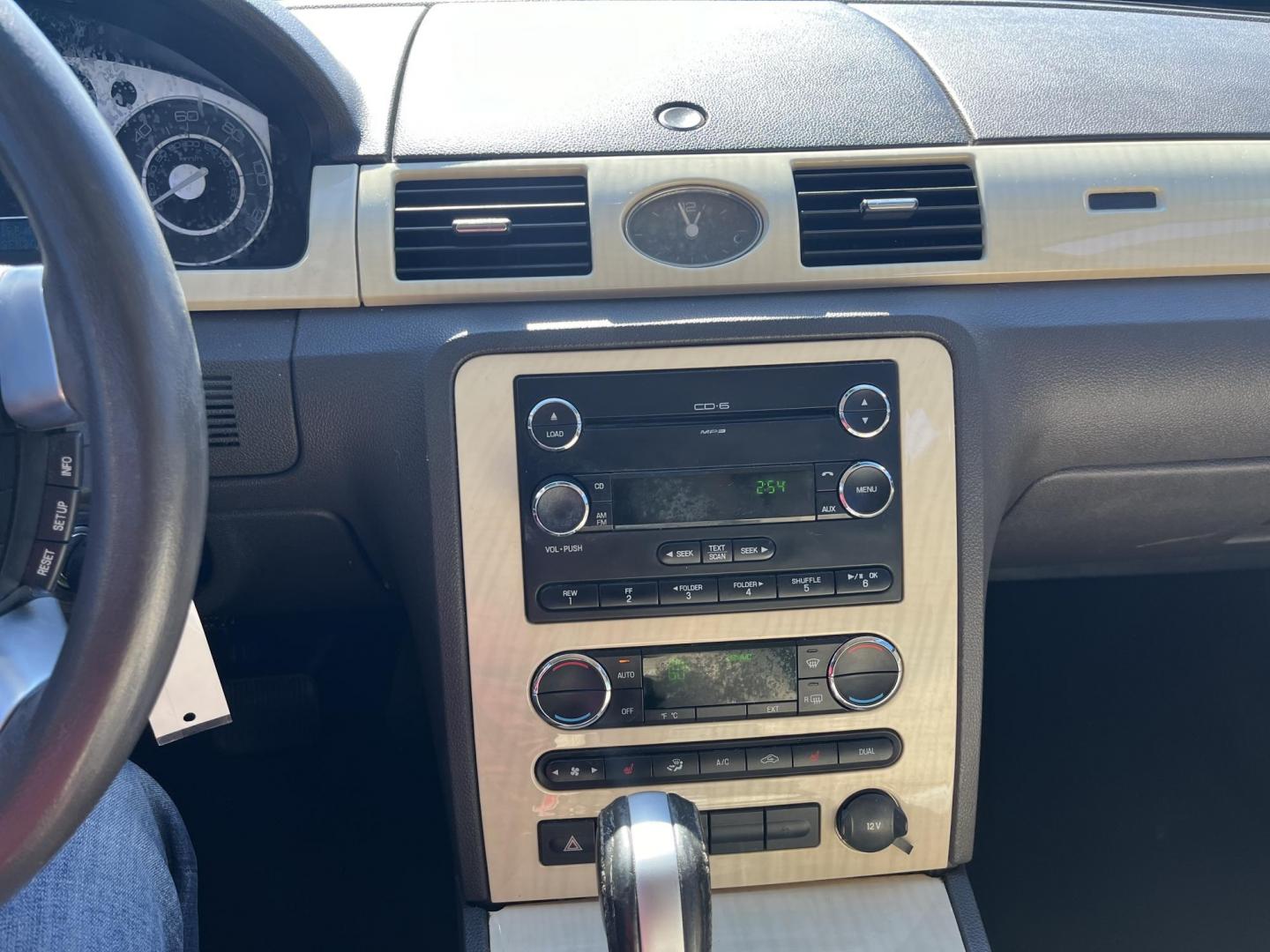 2008 maroom /TAN Mercury Sable Premier (1MEHM42W68G) with an 3.5L V6 DOHC 24V engine, 6-Speed Automatic Overdrive transmission, located at 14700 Tomball Parkway 249, Houston, TX, 77086, (281) 444-2200, 29.928619, -95.504074 - Photo#13