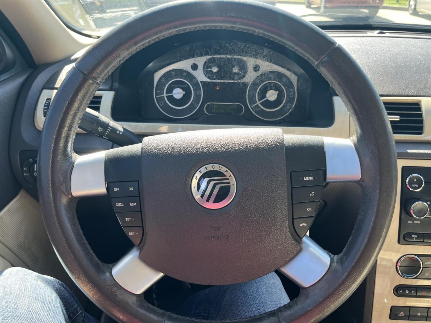 2008 maroom /TAN Mercury Sable Premier (1MEHM42W68G) with an 3.5L V6 DOHC 24V engine, 6-Speed Automatic Overdrive transmission, located at 14700 Tomball Parkway 249, Houston, TX, 77086, (281) 444-2200, 29.928619, -95.504074 - Photo#15