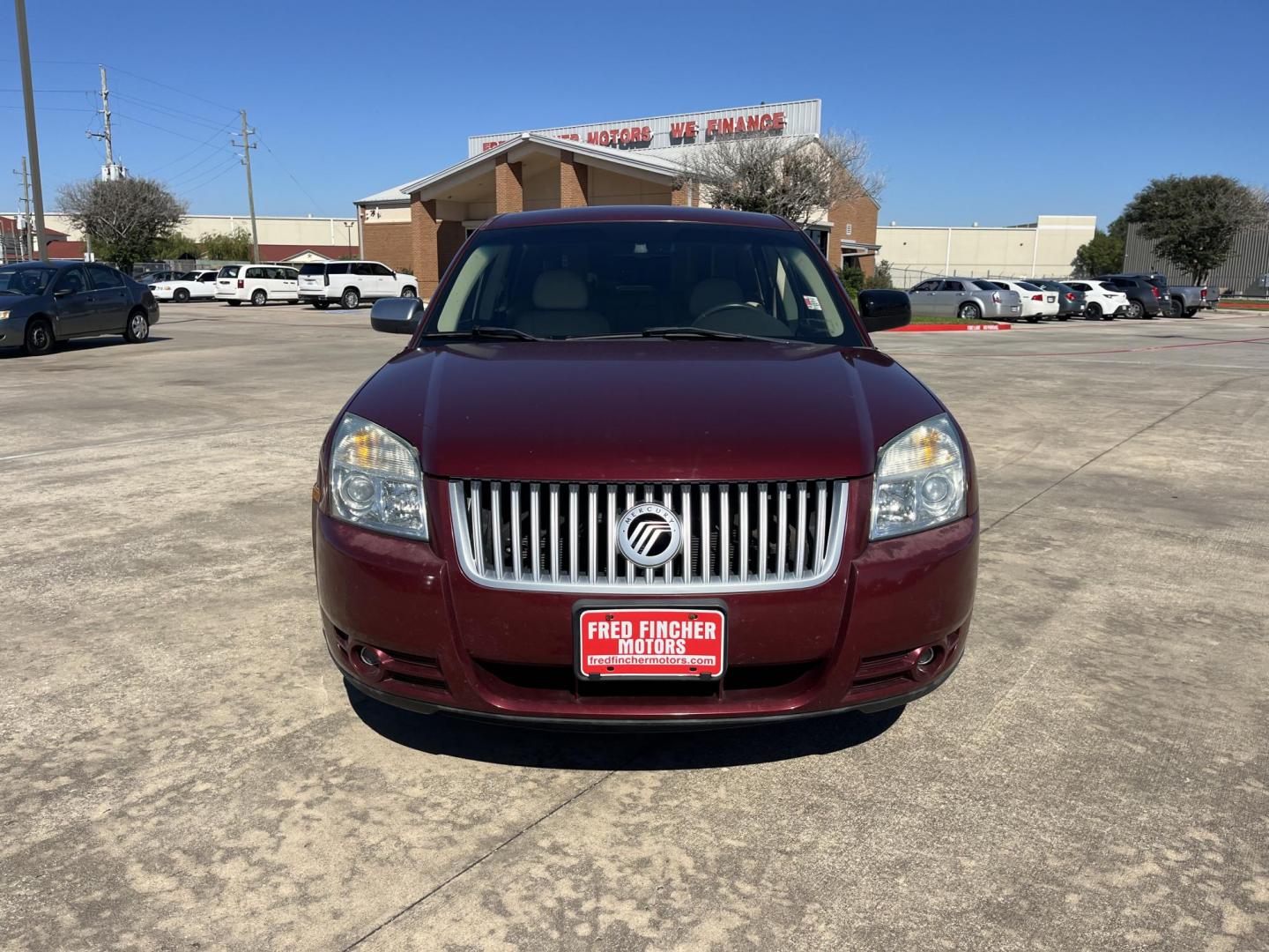 2008 maroom /TAN Mercury Sable Premier (1MEHM42W68G) with an 3.5L V6 DOHC 24V engine, 6-Speed Automatic Overdrive transmission, located at 14700 Tomball Parkway 249, Houston, TX, 77086, (281) 444-2200, 29.928619, -95.504074 - Photo#1
