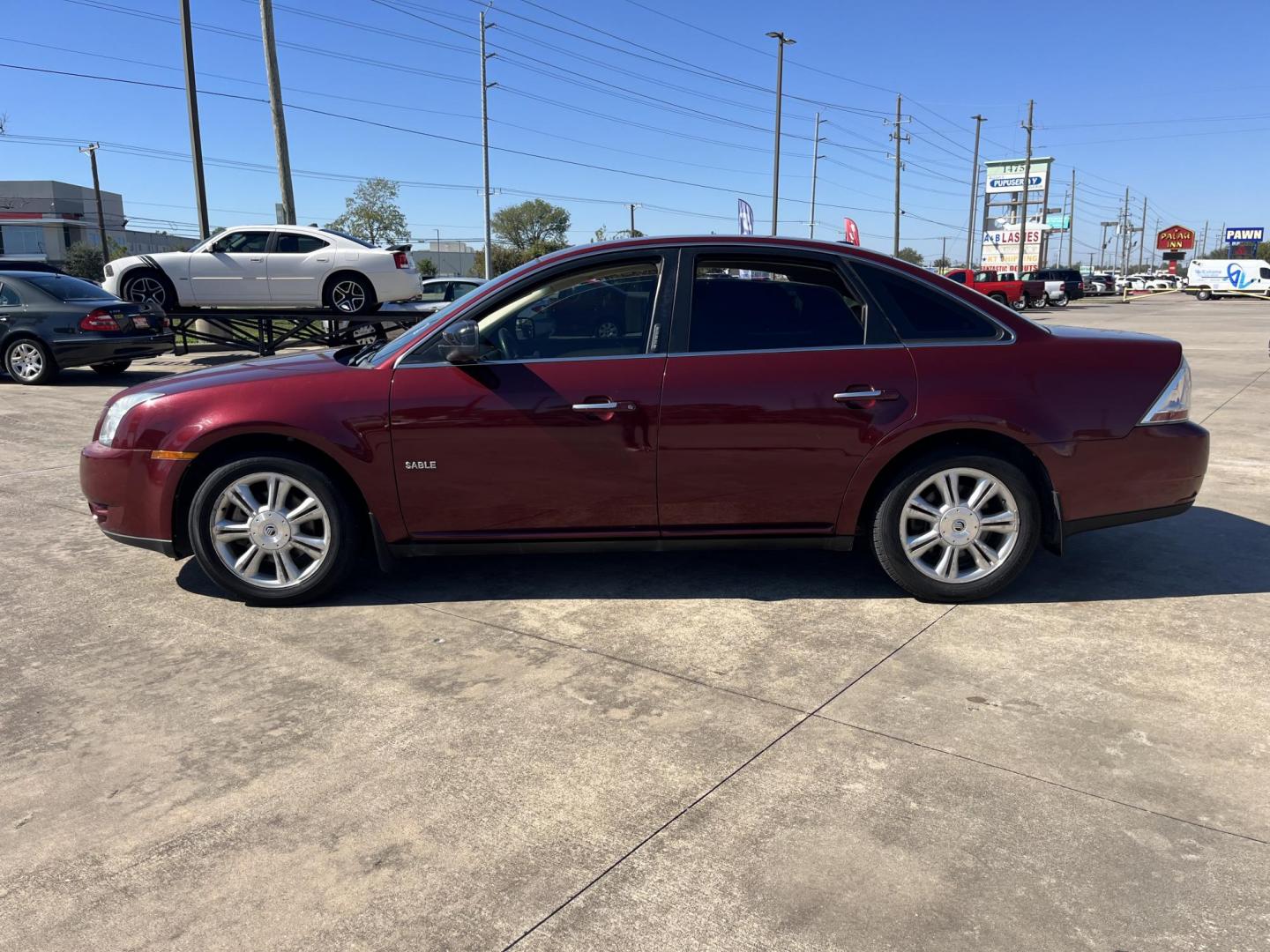2008 maroom /TAN Mercury Sable Premier (1MEHM42W68G) with an 3.5L V6 DOHC 24V engine, 6-Speed Automatic Overdrive transmission, located at 14700 Tomball Parkway 249, Houston, TX, 77086, (281) 444-2200, 29.928619, -95.504074 - Photo#3
