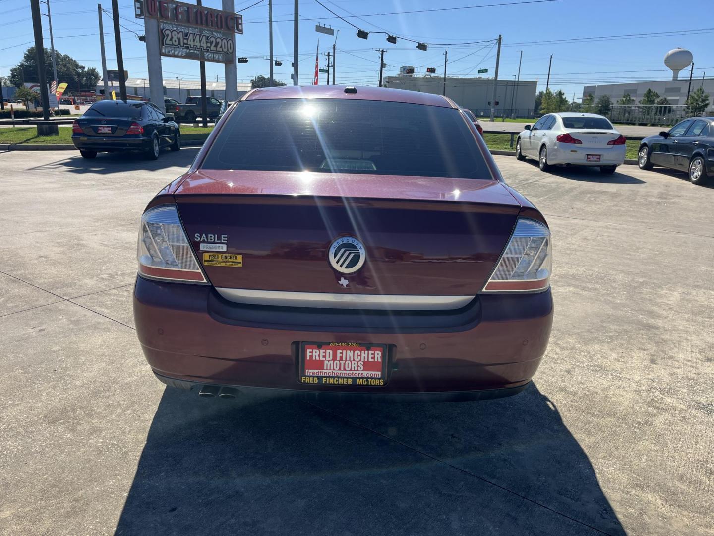 2008 maroom /TAN Mercury Sable Premier (1MEHM42W68G) with an 3.5L V6 DOHC 24V engine, 6-Speed Automatic Overdrive transmission, located at 14700 Tomball Parkway 249, Houston, TX, 77086, (281) 444-2200, 29.928619, -95.504074 - Photo#4