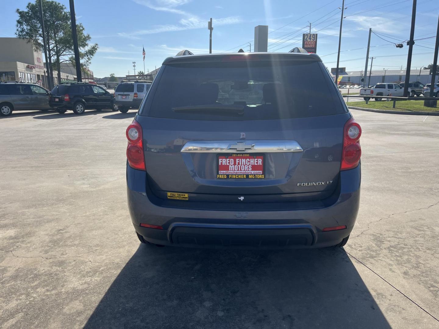 2014 blue /black Chevrolet Equinox 1LT 2WD (2GNALBEK7E6) with an 2.4L L4 DOHC 16V engine, 6-Speed Automatic transmission, located at 14700 Tomball Parkway 249, Houston, TX, 77086, (281) 444-2200, 29.928619, -95.504074 - Photo#3