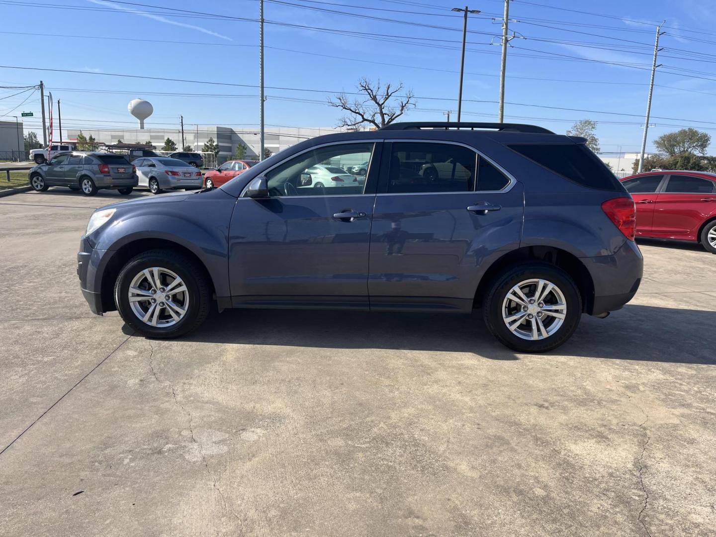 2014 blue /black Chevrolet Equinox 1LT 2WD (2GNALBEK7E6) with an 2.4L L4 DOHC 16V engine, 6-Speed Automatic transmission, located at 14700 Tomball Parkway 249, Houston, TX, 77086, (281) 444-2200, 29.928619, -95.504074 - Photo#4