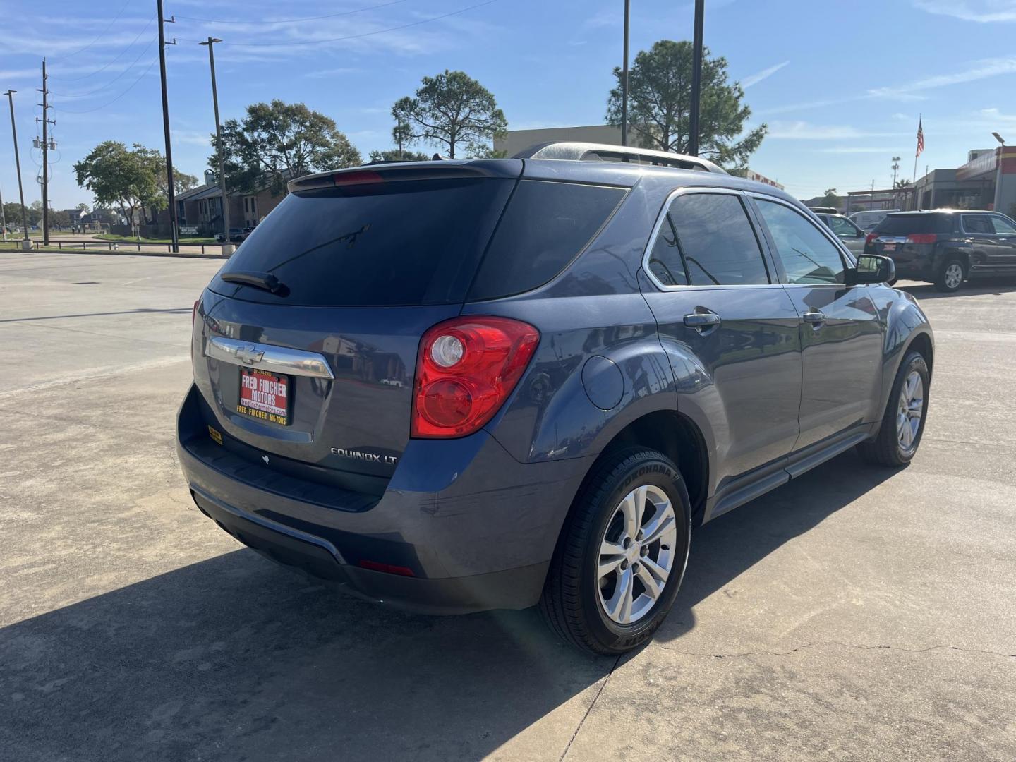 2014 blue /black Chevrolet Equinox 1LT 2WD (2GNALBEK7E6) with an 2.4L L4 DOHC 16V engine, 6-Speed Automatic transmission, located at 14700 Tomball Parkway 249, Houston, TX, 77086, (281) 444-2200, 29.928619, -95.504074 - Photo#6