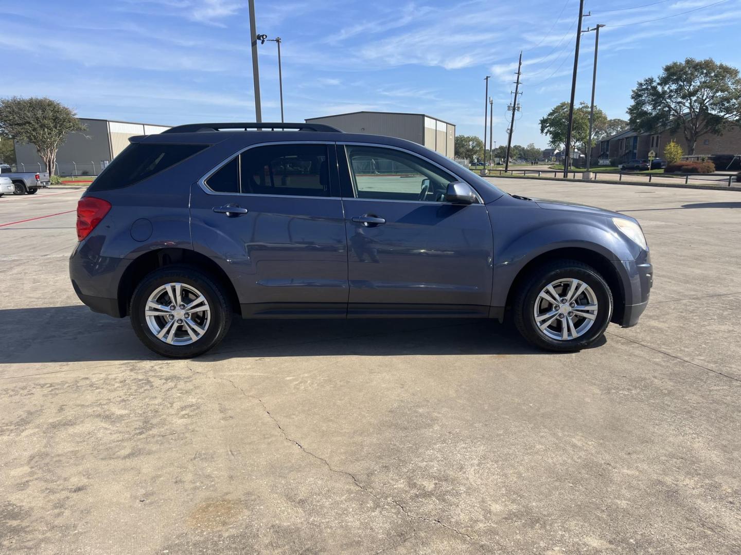 2014 blue /black Chevrolet Equinox 1LT 2WD (2GNALBEK7E6) with an 2.4L L4 DOHC 16V engine, 6-Speed Automatic transmission, located at 14700 Tomball Parkway 249, Houston, TX, 77086, (281) 444-2200, 29.928619, -95.504074 - Photo#7