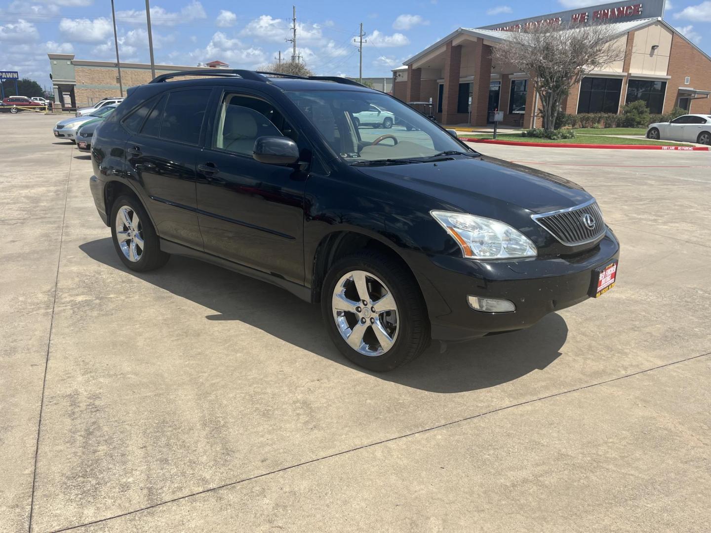 2009 black /TAN Lexus RX 350 FWD (2T2GK31U89C) with an 3.5L V6 DOHC 24V engine, 5-Speed Automatic Overdrive transmission, located at 14700 Tomball Parkway 249, Houston, TX, 77086, (281) 444-2200, 29.928619, -95.504074 - Photo#0