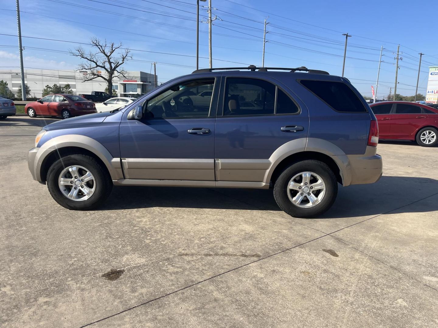 2006 blue /gray Kia Sorento EX 4WD (KNDJC733065) with an 3.5L V6 DOHC 16V engine, 5-Speed Automatic Overdrive transmission, located at 14700 Tomball Parkway 249, Houston, TX, 77086, (281) 444-2200, 29.928619, -95.504074 - Photo#3