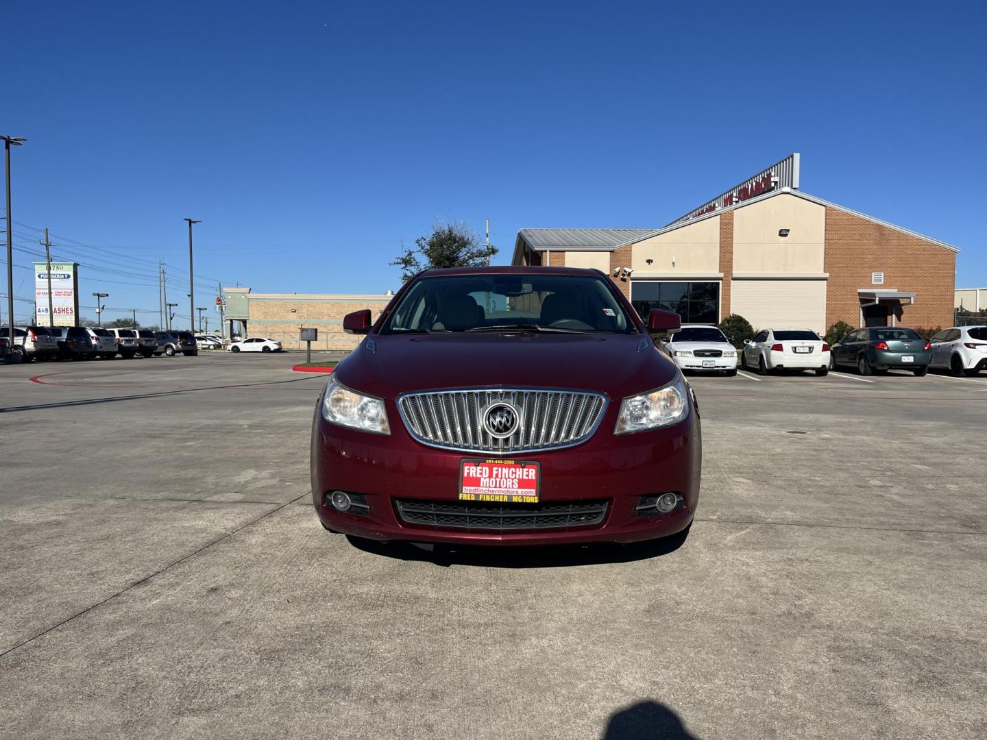 2010 red /tan Buick LaCrosse CXL FWD (1G4GC5EGXAF) with an 3.0L V6 DOHC 24V engine, 6-Speed Automatic Overdrive transmission, located at 14700 Tomball Parkway 249, Houston, TX, 77086, (281) 444-2200, 29.928619, -95.504074 - Photo#2