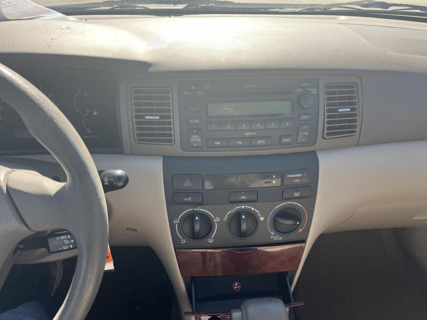 2006 white /TAN Toyota Corolla CE (2T1BR32E26C) with an 1.8L L4 DOHC 16V engine, Automatic Overdrive transmission, located at 14700 Tomball Parkway 249, Houston, TX, 77086, (281) 444-2200, 29.928619, -95.504074 - Photo#13