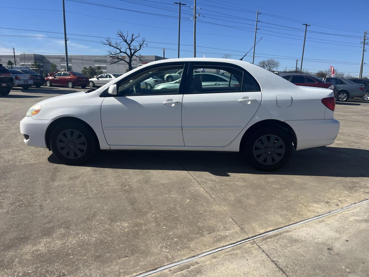 2006 white /TAN Toyota Corolla CE (2T1BR32E26C) with an 1.8L L4 DOHC 16V engine, Automatic Overdrive transmission, located at 14700 Tomball Parkway 249, Houston, TX, 77086, (281) 444-2200, 29.928619, -95.504074 - Photo#3