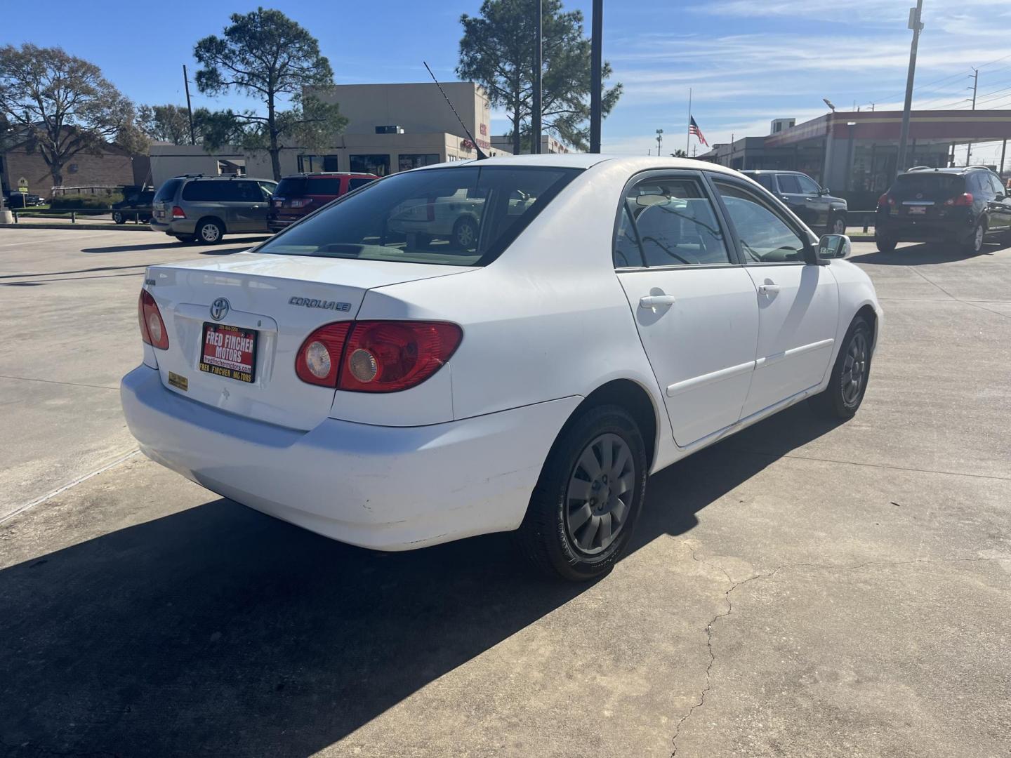 2006 white /TAN Toyota Corolla CE (2T1BR32E26C) with an 1.8L L4 DOHC 16V engine, Automatic Overdrive transmission, located at 14700 Tomball Parkway 249, Houston, TX, 77086, (281) 444-2200, 29.928619, -95.504074 - Photo#6