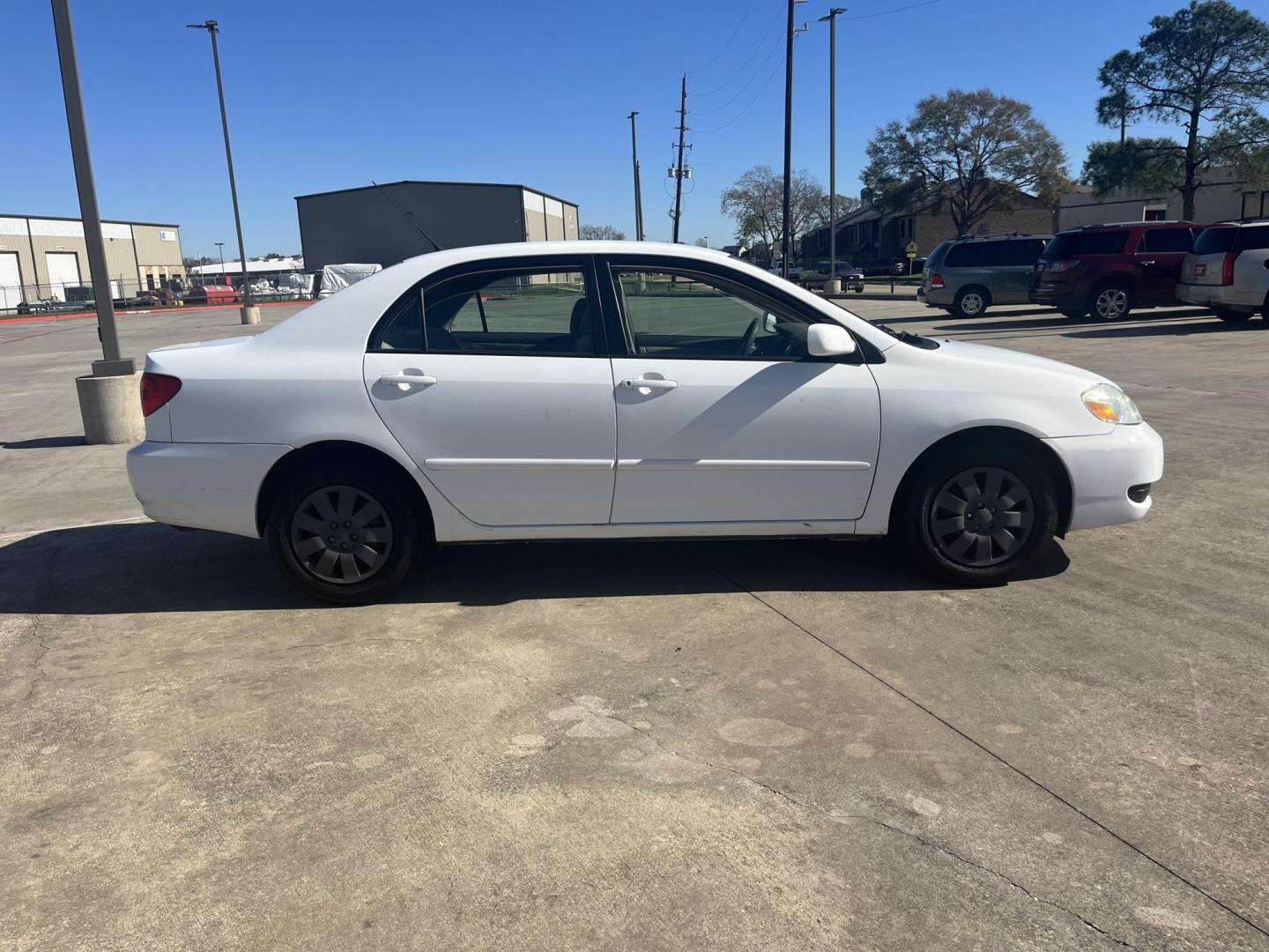 2006 white /TAN Toyota Corolla CE (2T1BR32E26C) with an 1.8L L4 DOHC 16V engine, Automatic Overdrive transmission, located at 14700 Tomball Parkway 249, Houston, TX, 77086, (281) 444-2200, 29.928619, -95.504074 - Photo#7