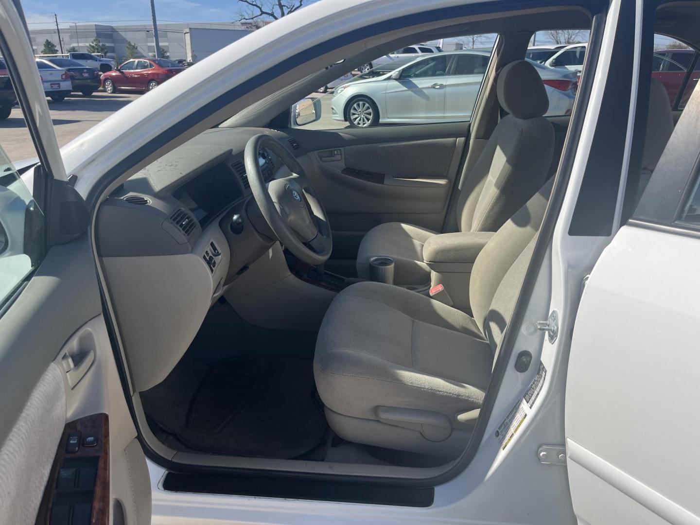 2006 white /TAN Toyota Corolla CE (2T1BR32E26C) with an 1.8L L4 DOHC 16V engine, Automatic Overdrive transmission, located at 14700 Tomball Parkway 249, Houston, TX, 77086, (281) 444-2200, 29.928619, -95.504074 - Photo#8