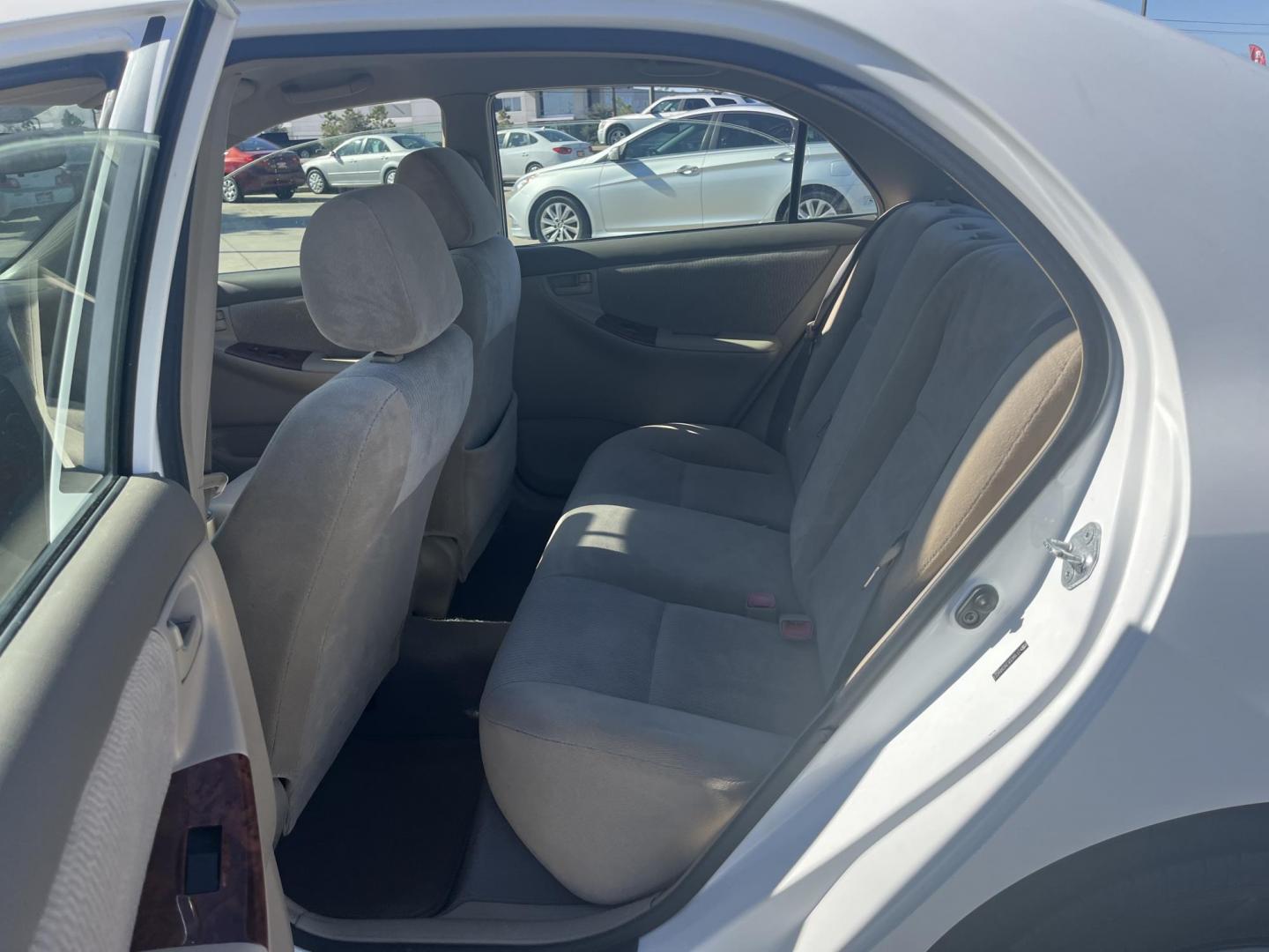 2006 white /TAN Toyota Corolla CE (2T1BR32E26C) with an 1.8L L4 DOHC 16V engine, Automatic Overdrive transmission, located at 14700 Tomball Parkway 249, Houston, TX, 77086, (281) 444-2200, 29.928619, -95.504074 - Photo#9