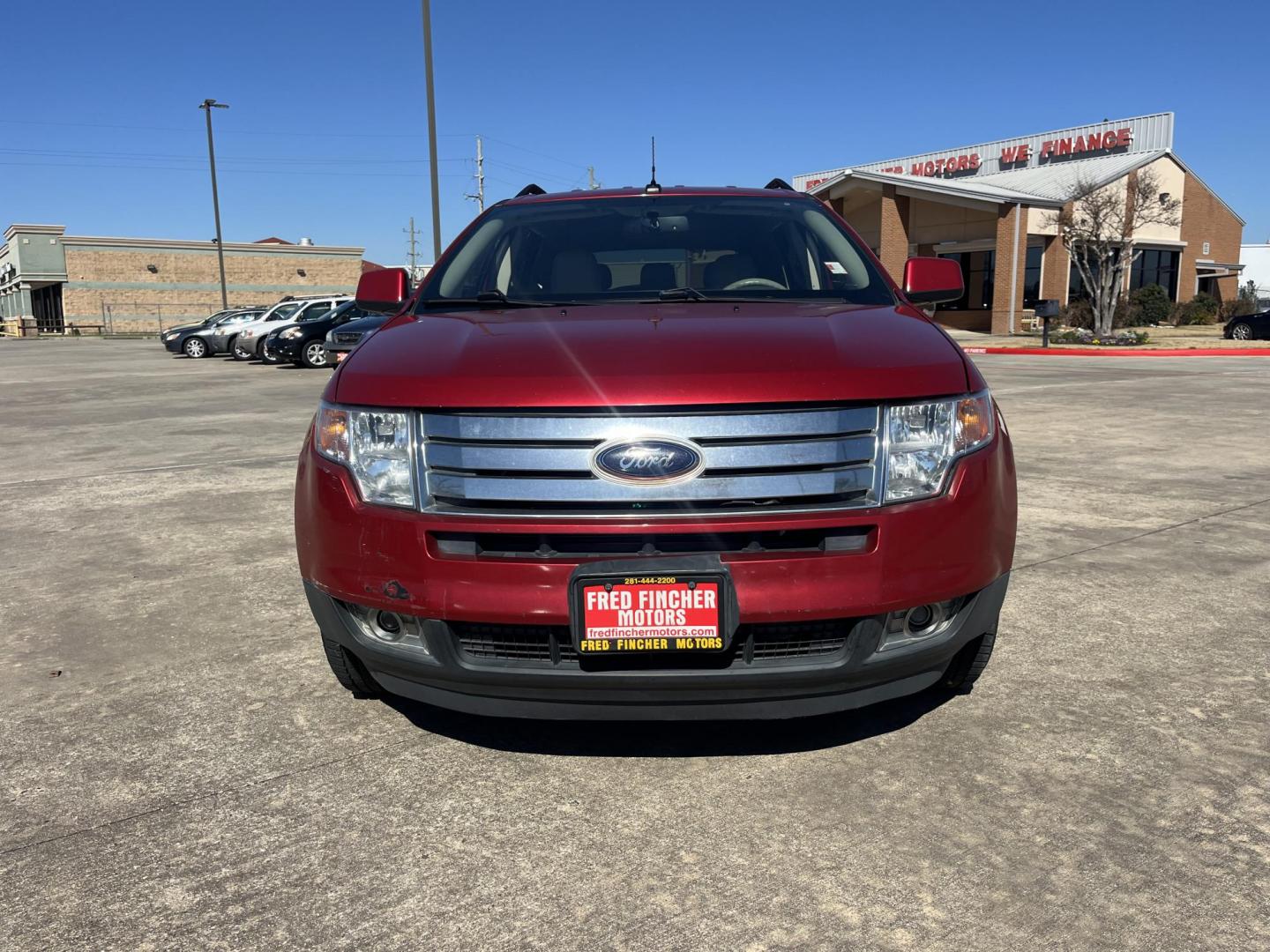 2010 red /black Ford Edge SEL FWD (2FMDK3JC3AB) with an 3.5L V6 DOHC 24V engine, 6-Speed Automatic transmission, located at 14700 Tomball Parkway 249, Houston, TX, 77086, (281) 444-2200, 29.928619, -95.504074 - Photo#1