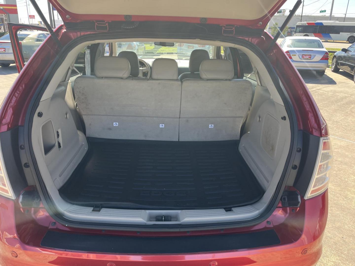 2010 red /black Ford Edge SEL FWD (2FMDK3JC3AB) with an 3.5L V6 DOHC 24V engine, 6-Speed Automatic transmission, located at 14700 Tomball Parkway 249, Houston, TX, 77086, (281) 444-2200, 29.928619, -95.504074 - Photo#13
