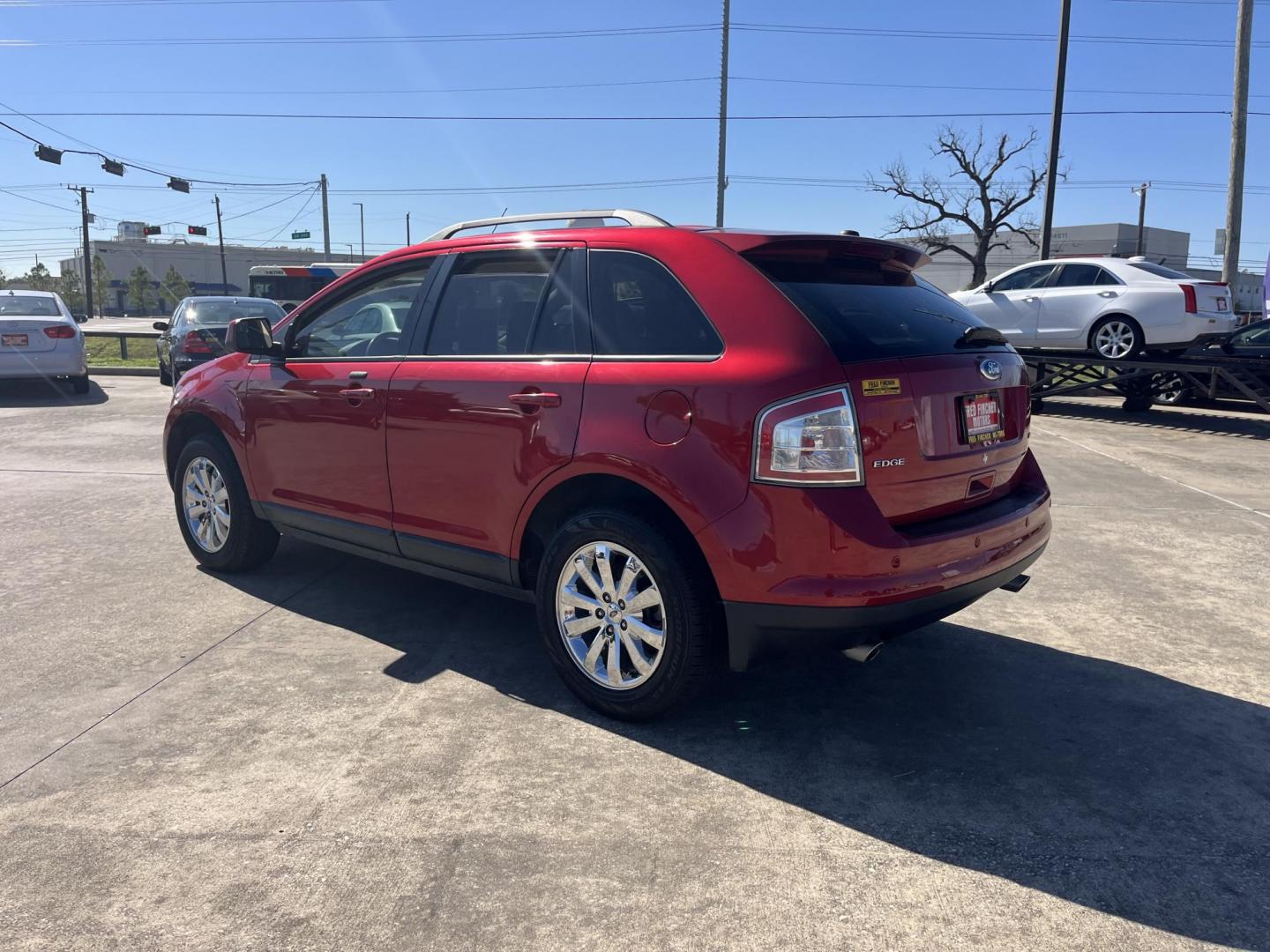 2010 red /black Ford Edge SEL FWD (2FMDK3JC3AB) with an 3.5L V6 DOHC 24V engine, 6-Speed Automatic transmission, located at 14700 Tomball Parkway 249, Houston, TX, 77086, (281) 444-2200, 29.928619, -95.504074 - Photo#5