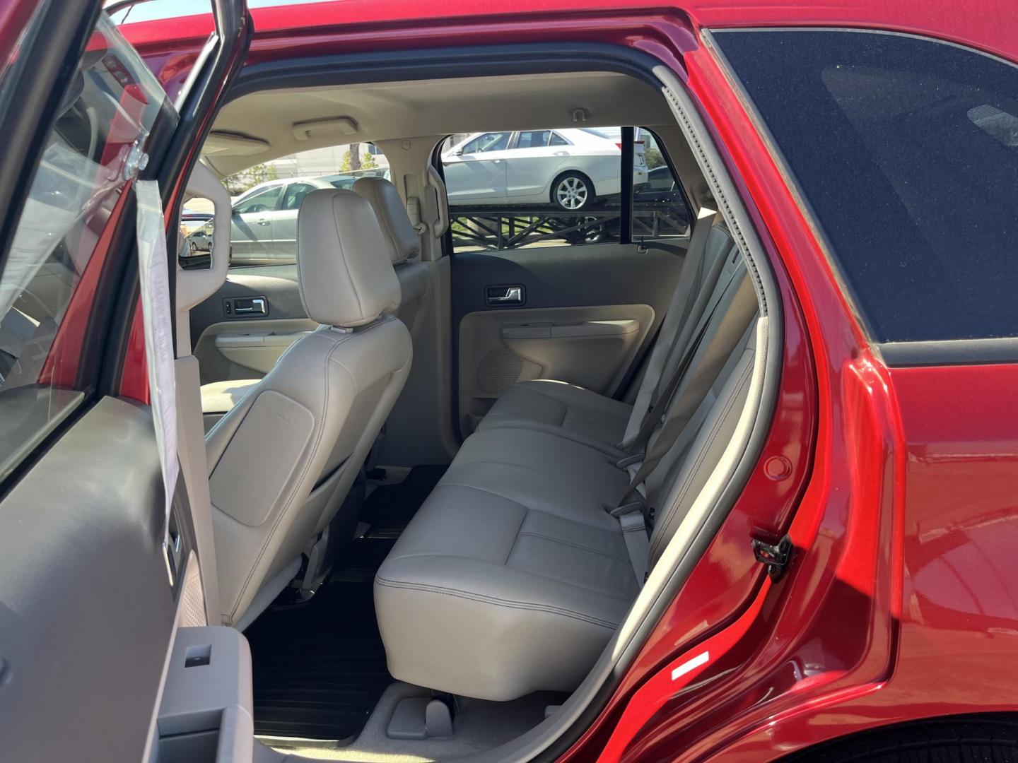 2010 red /black Ford Edge SEL FWD (2FMDK3JC3AB) with an 3.5L V6 DOHC 24V engine, 6-Speed Automatic transmission, located at 14700 Tomball Parkway 249, Houston, TX, 77086, (281) 444-2200, 29.928619, -95.504074 - Photo#7