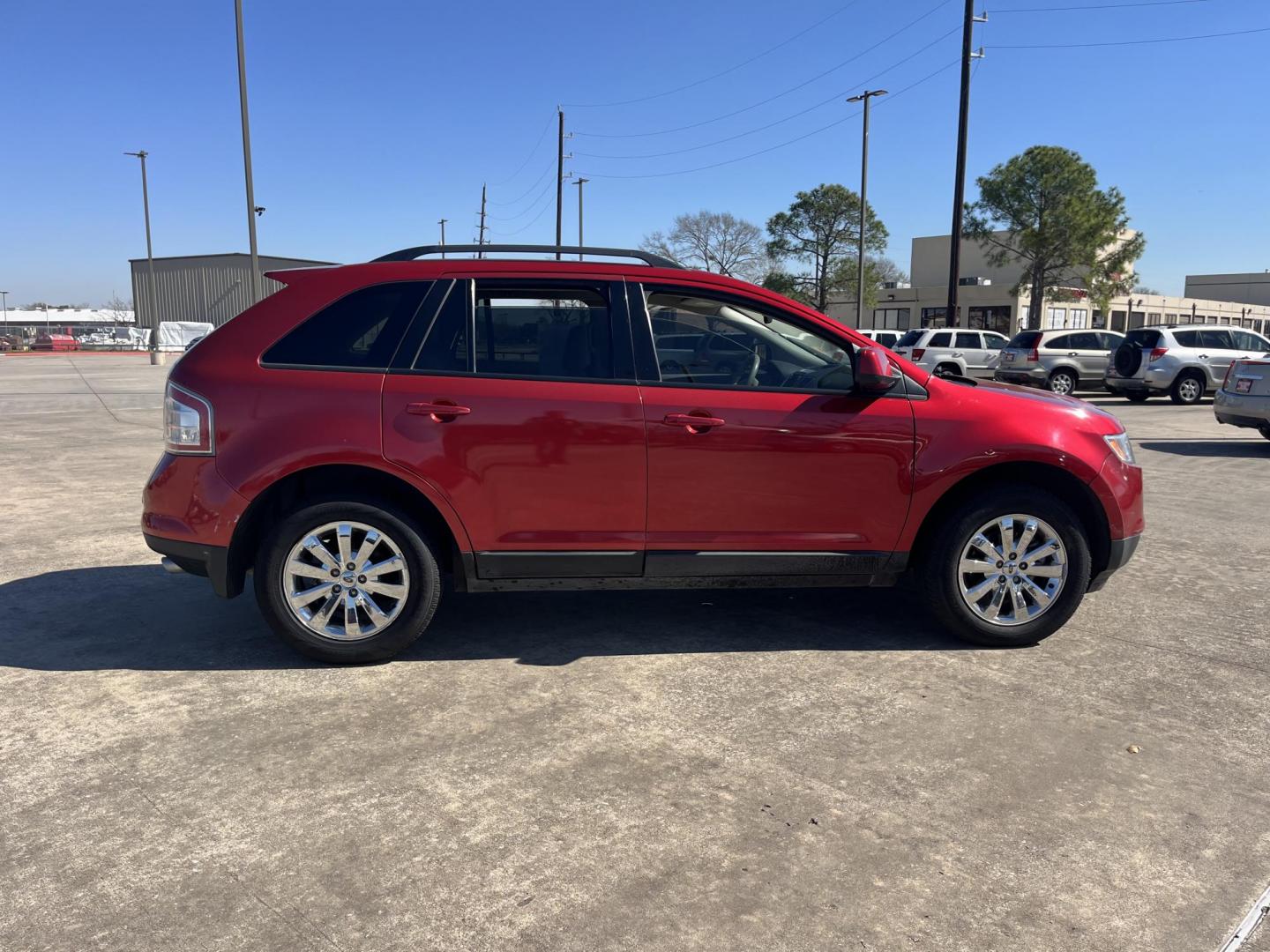 2010 red /black Ford Edge SEL FWD (2FMDK3JC3AB) with an 3.5L V6 DOHC 24V engine, 6-Speed Automatic transmission, located at 14700 Tomball Parkway 249, Houston, TX, 77086, (281) 444-2200, 29.928619, -95.504074 - Photo#9