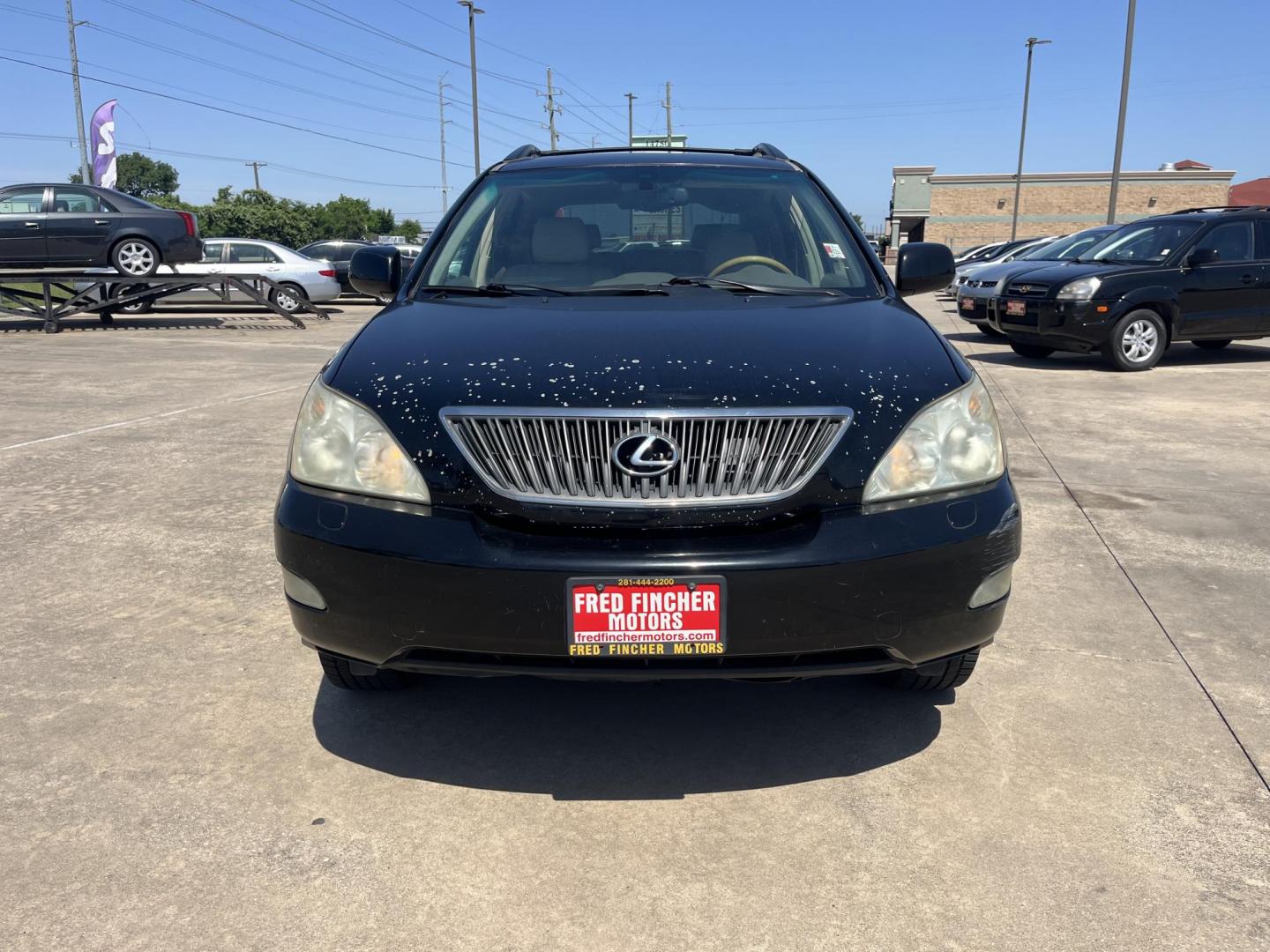 2007 black /gray Lexus RX 350 FWD (2T2GK31U27C) with an 3.5L V6 DOHC 24V engine, 5-Speed Automatic Overdrive transmission, located at 14700 Tomball Parkway 249, Houston, TX, 77086, (281) 444-2200, 29.928619, -95.504074 - Photo#1